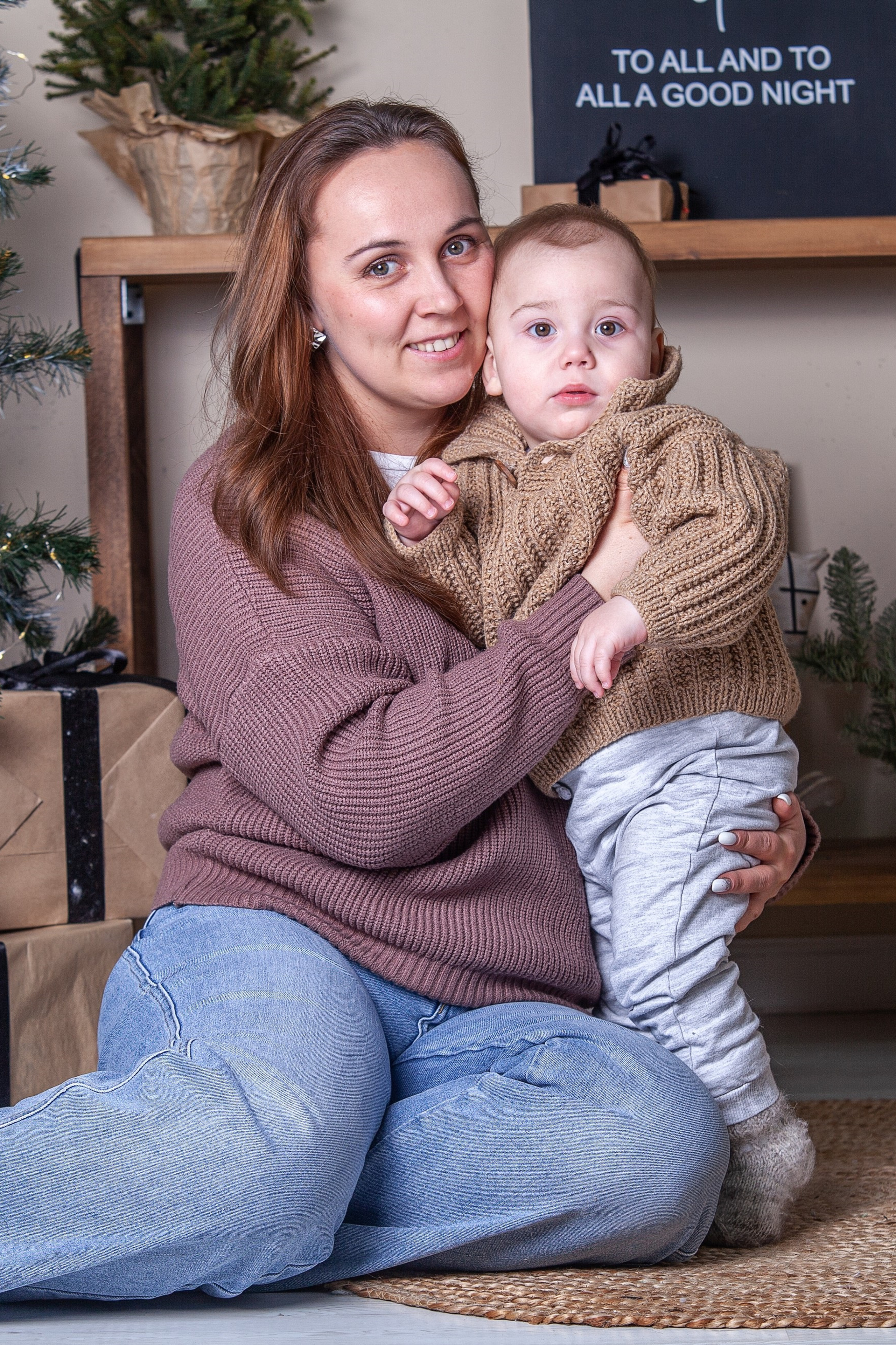 A happy family on the background of a beautiful natural landscape, smiling parents and children creating a warm and friendly atmosphere at a family photo shoot