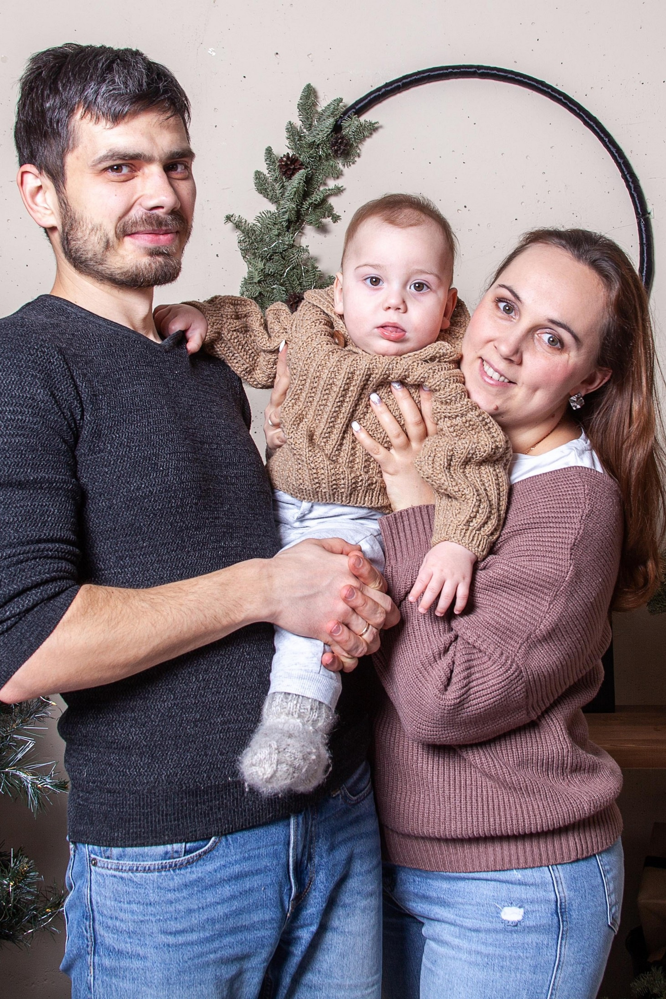 A happy family on the background of a beautiful natural landscape, smiling parents and children creating a warm and friendly atmosphere at a family photo shoot