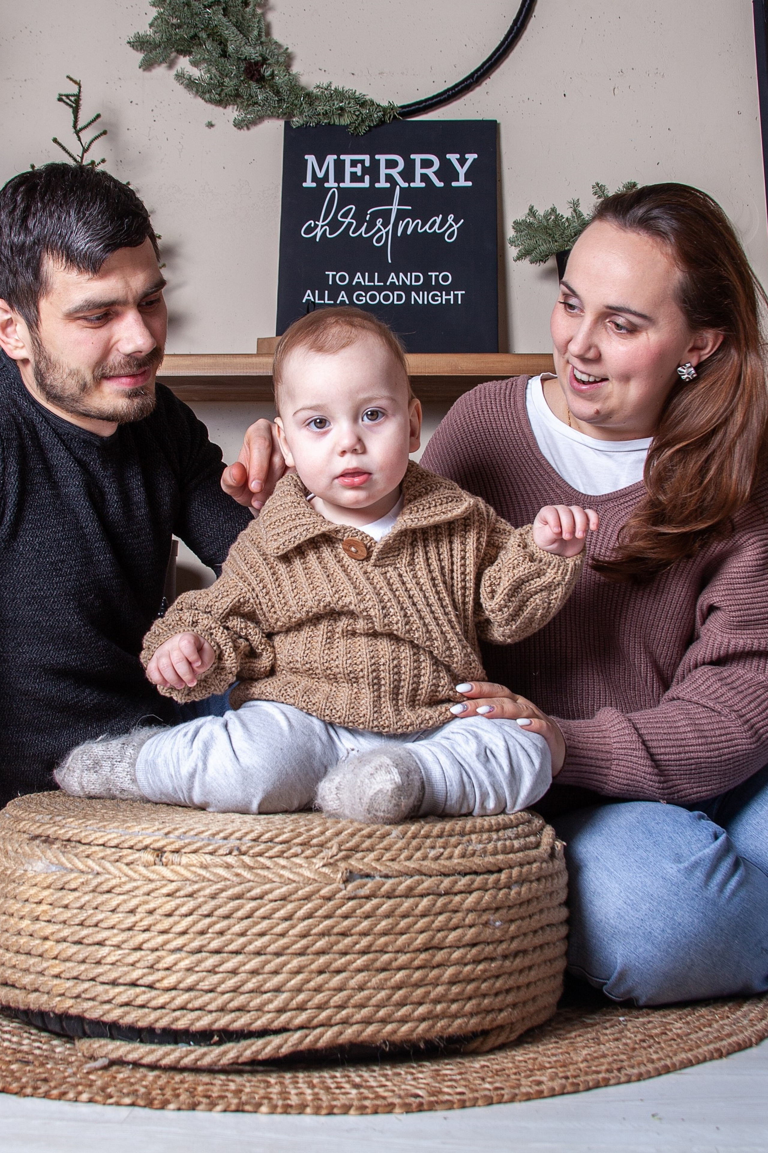 A happy family on the background of a beautiful natural landscape, smiling parents and children creating a warm and friendly atmosphere at a family photo shoot