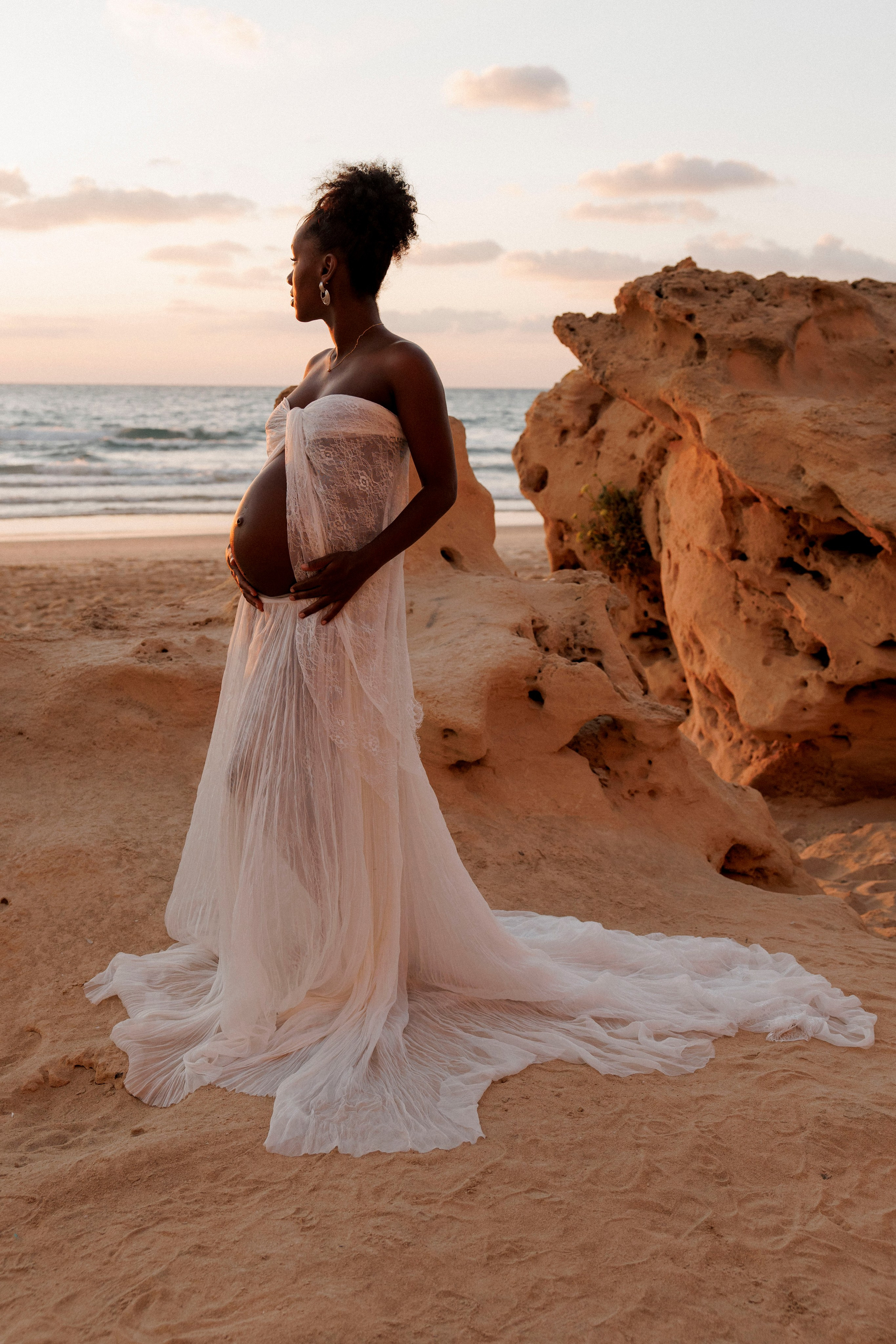 Pregnancy photoshoot near the sea