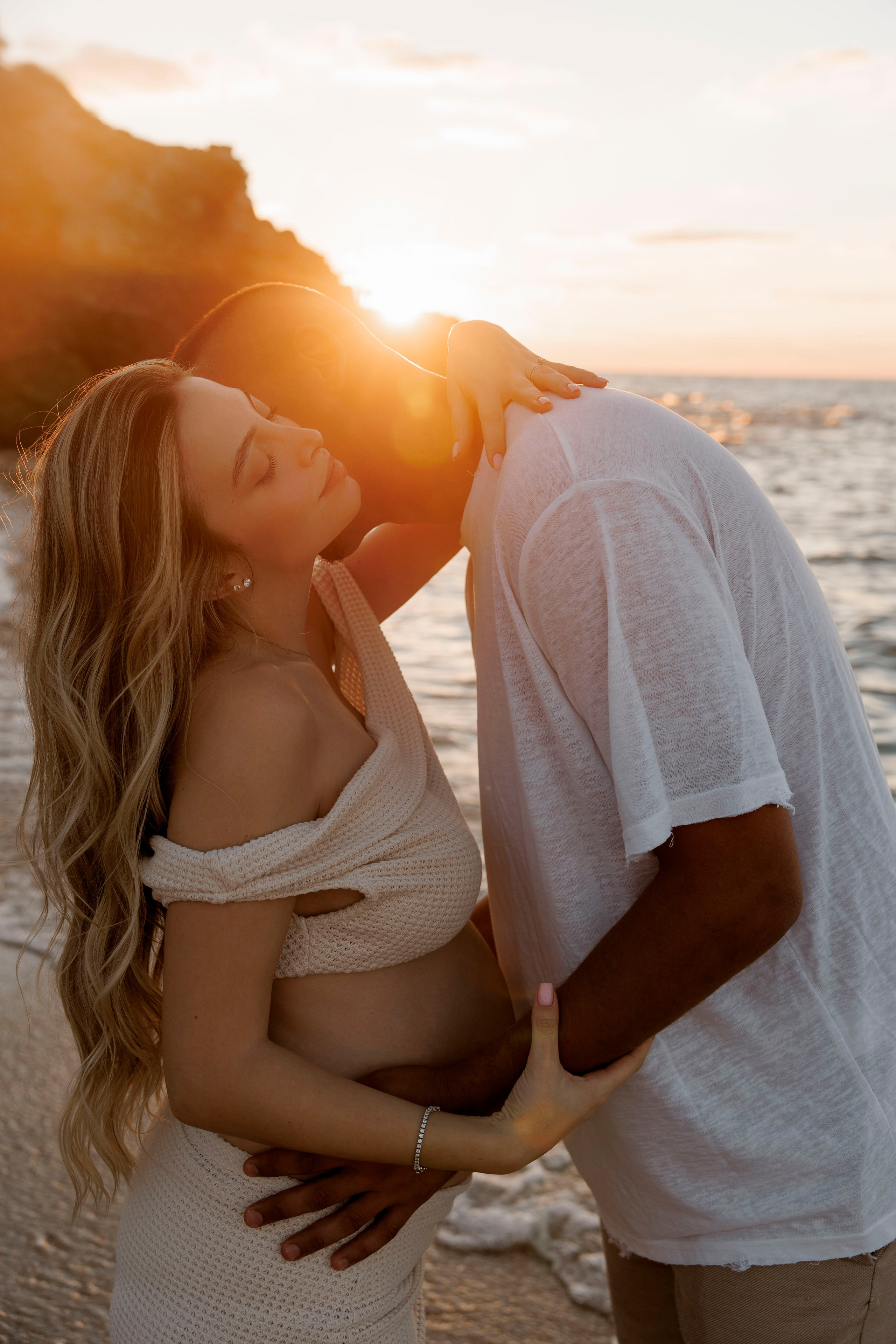 Pregnancy photoshoot near the sea