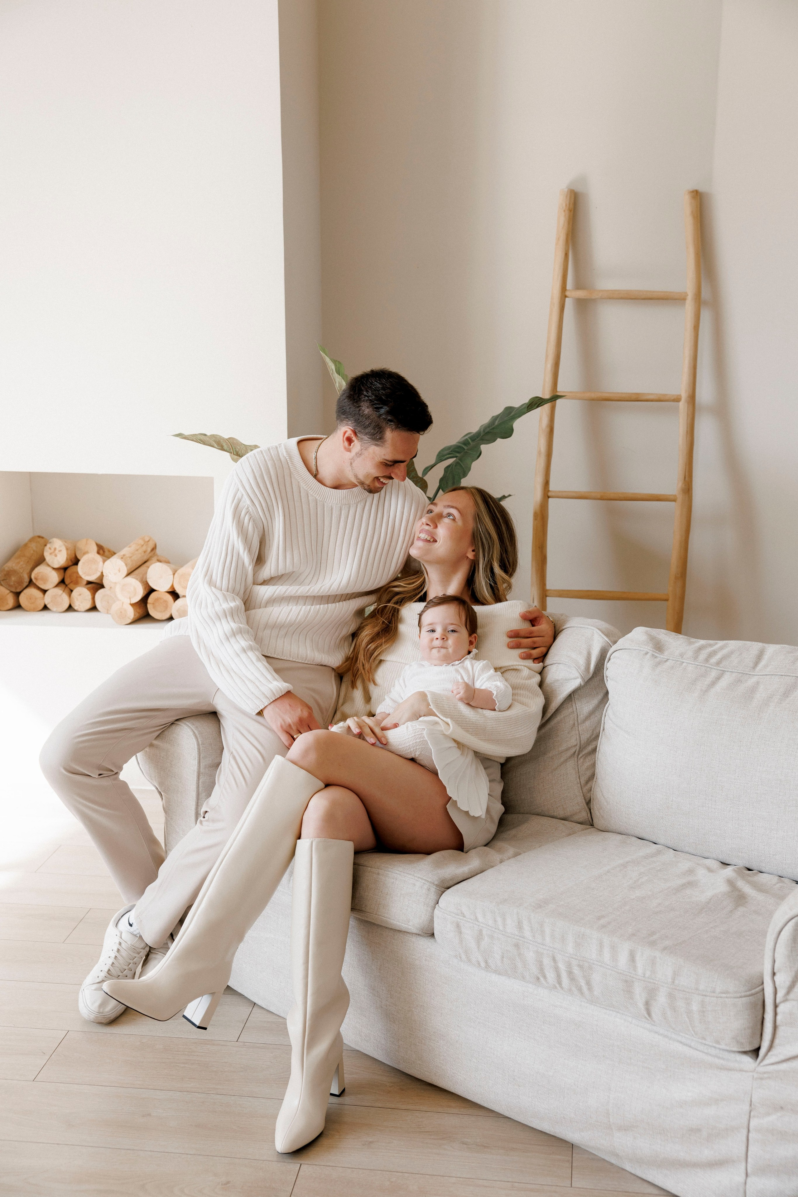 6 months old family photoshoot inside the white studio