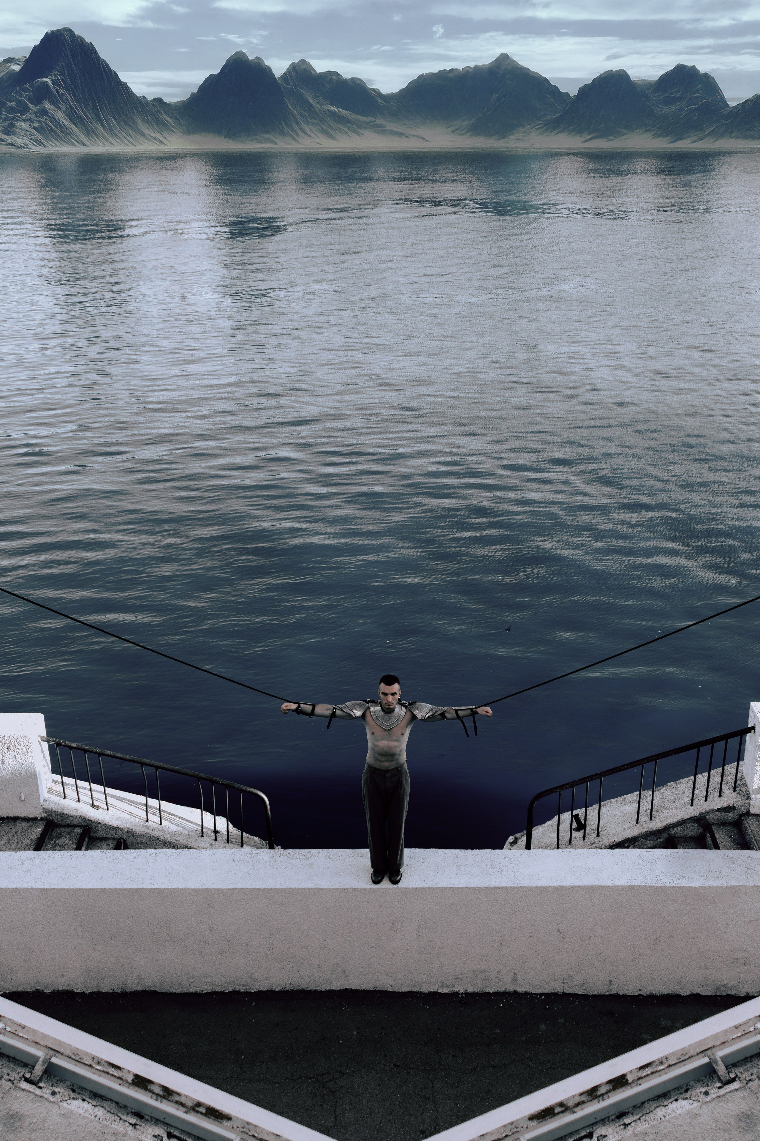 На фоне гор и воды мужчина в рыцарских доспехах связан веревкой за руки и растянут в сторону