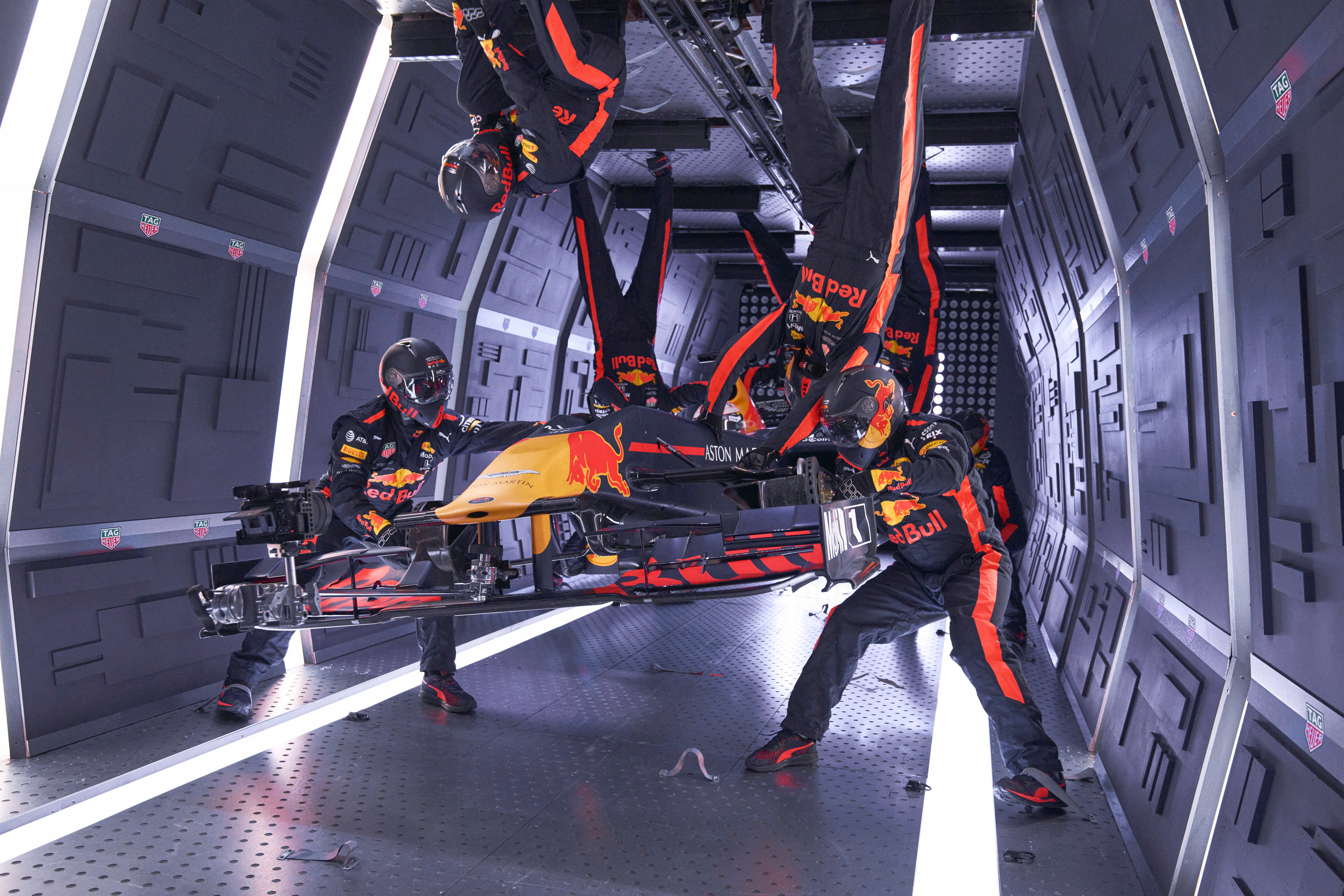 Pit-stop of Formula 1 car in Z-gravity