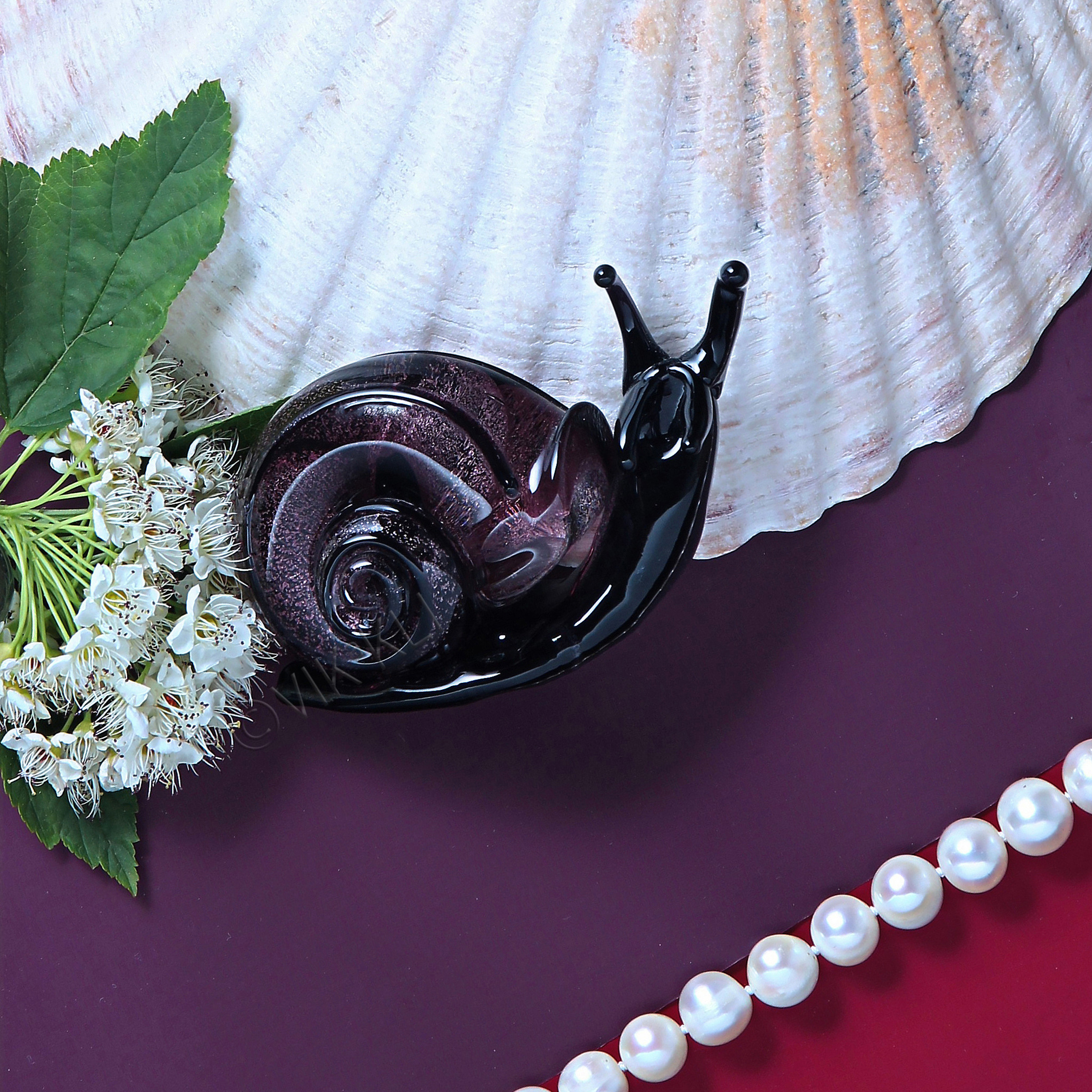 Улитка из муранского стекла. Имиджевое фото.