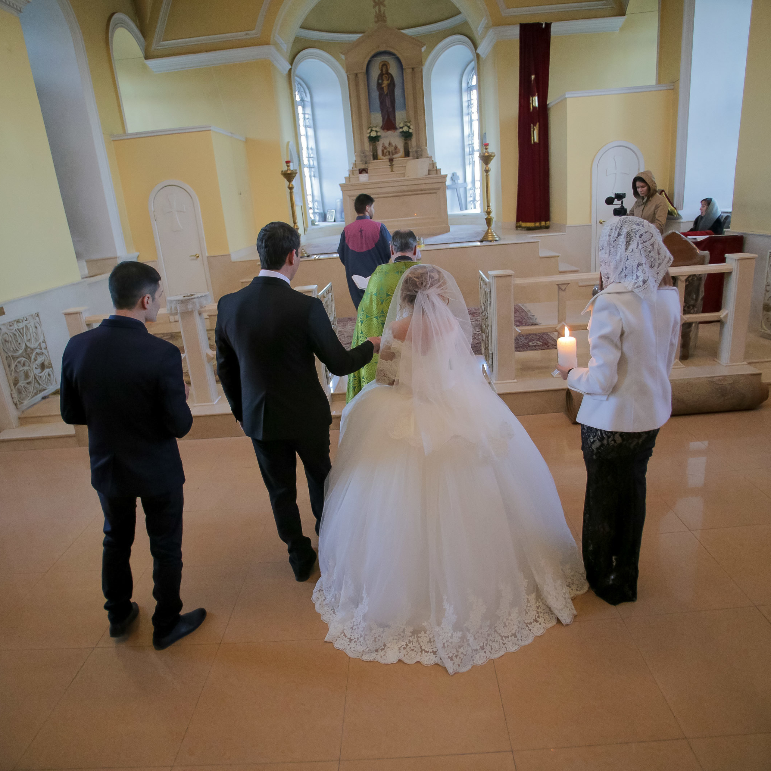 Photographer of church rites. Professional photo and video shooting of. Max Matvich and Victoria Basova are professionals in their field