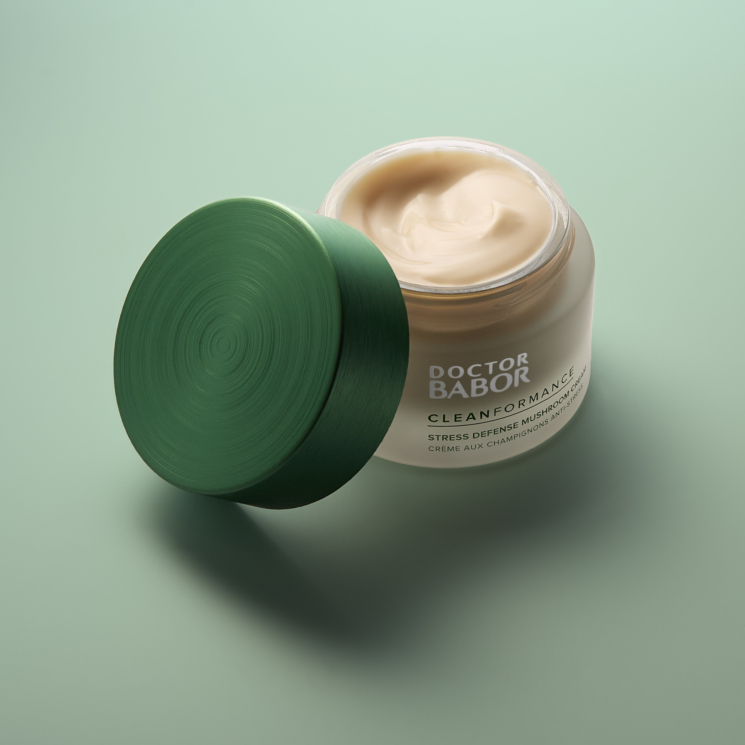 фото крема на цветном фоне с текстурой, предметная съёмка косметики