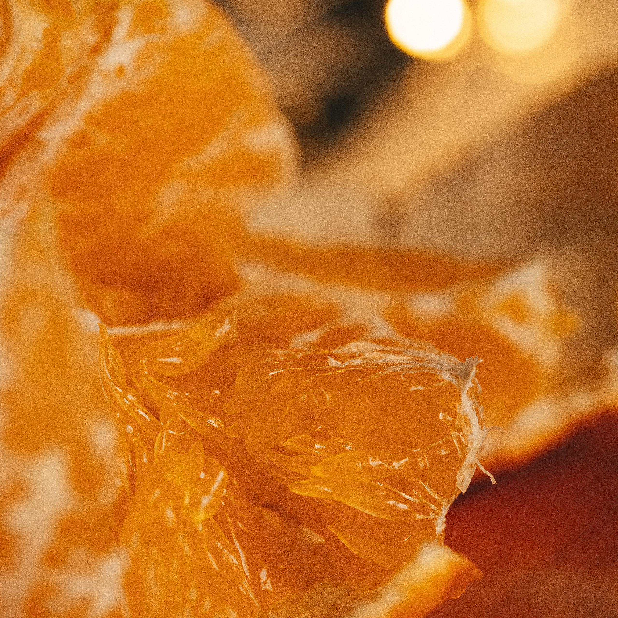 почищенный мандарин макро