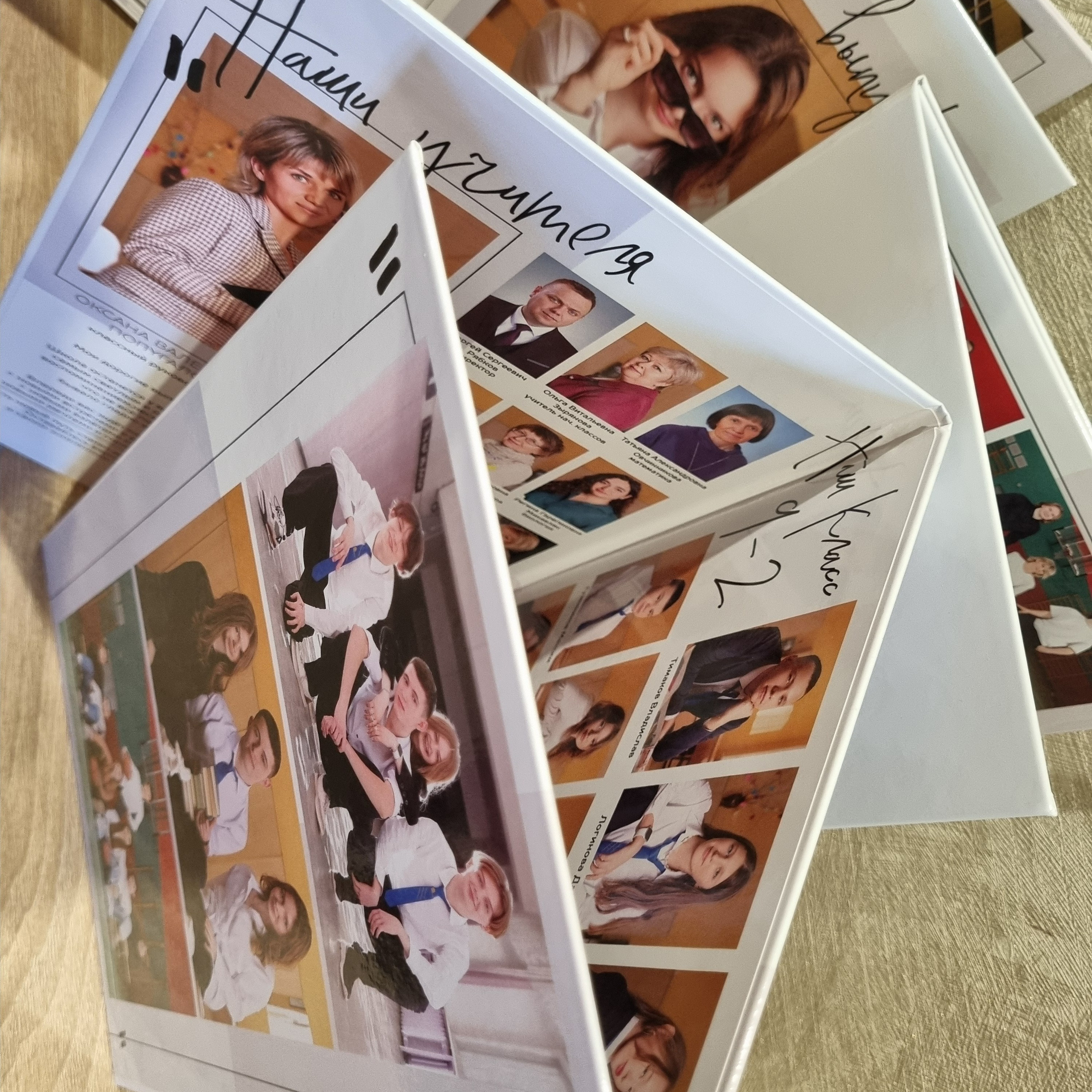 Фото готовых выпускных альбомов для детского сада и школы в Иваново Ярославле Костроме Владимире. Выпускные альбомы в Иваново в детский сад и школу. Александр и Светлана Янкины