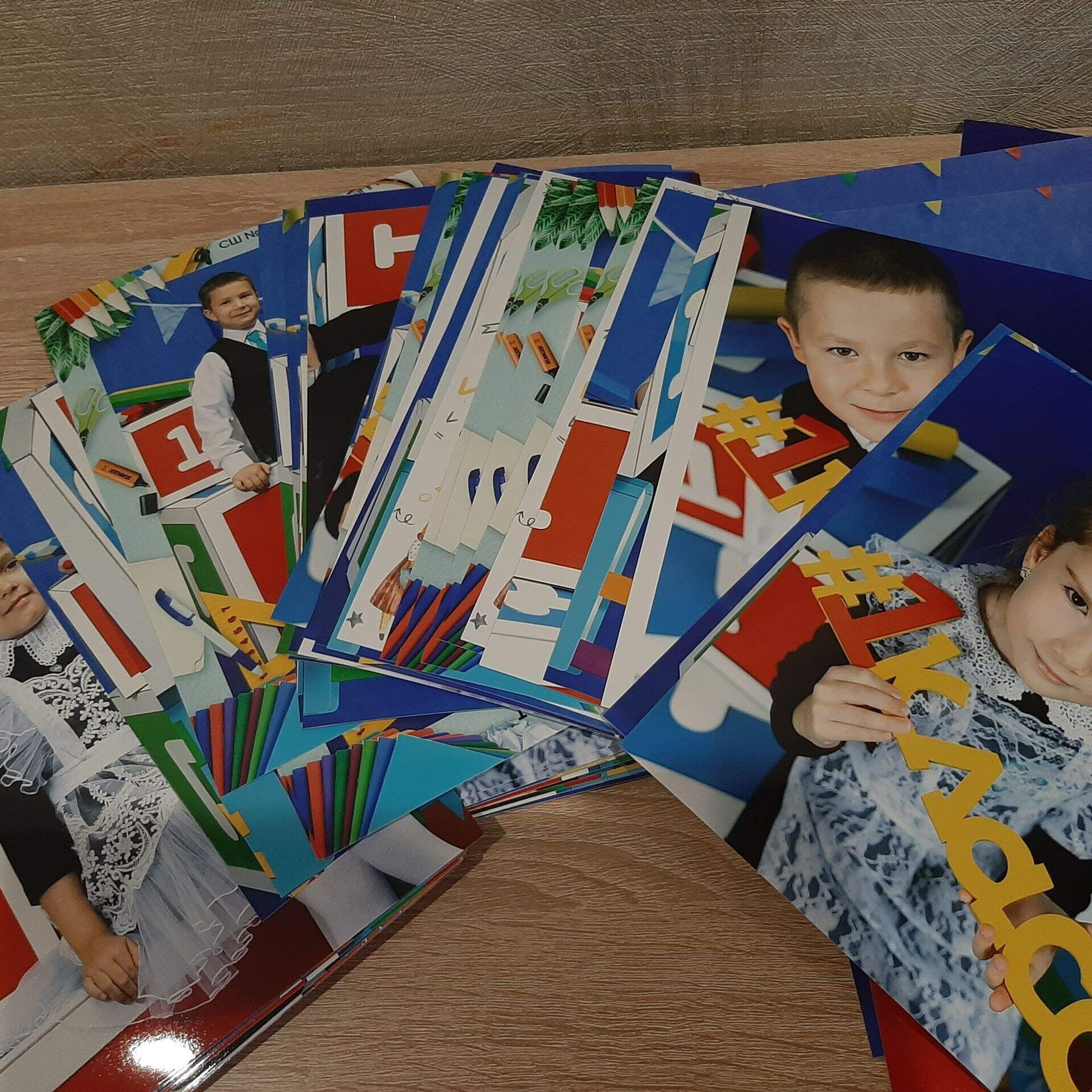Фото готовых выпускных альбомов для детского сада и школы в Иваново Ярославле Костроме Владимире. Выпускные альбомы в Иваново в детский сад и школу. Александр и Светлана Янкины