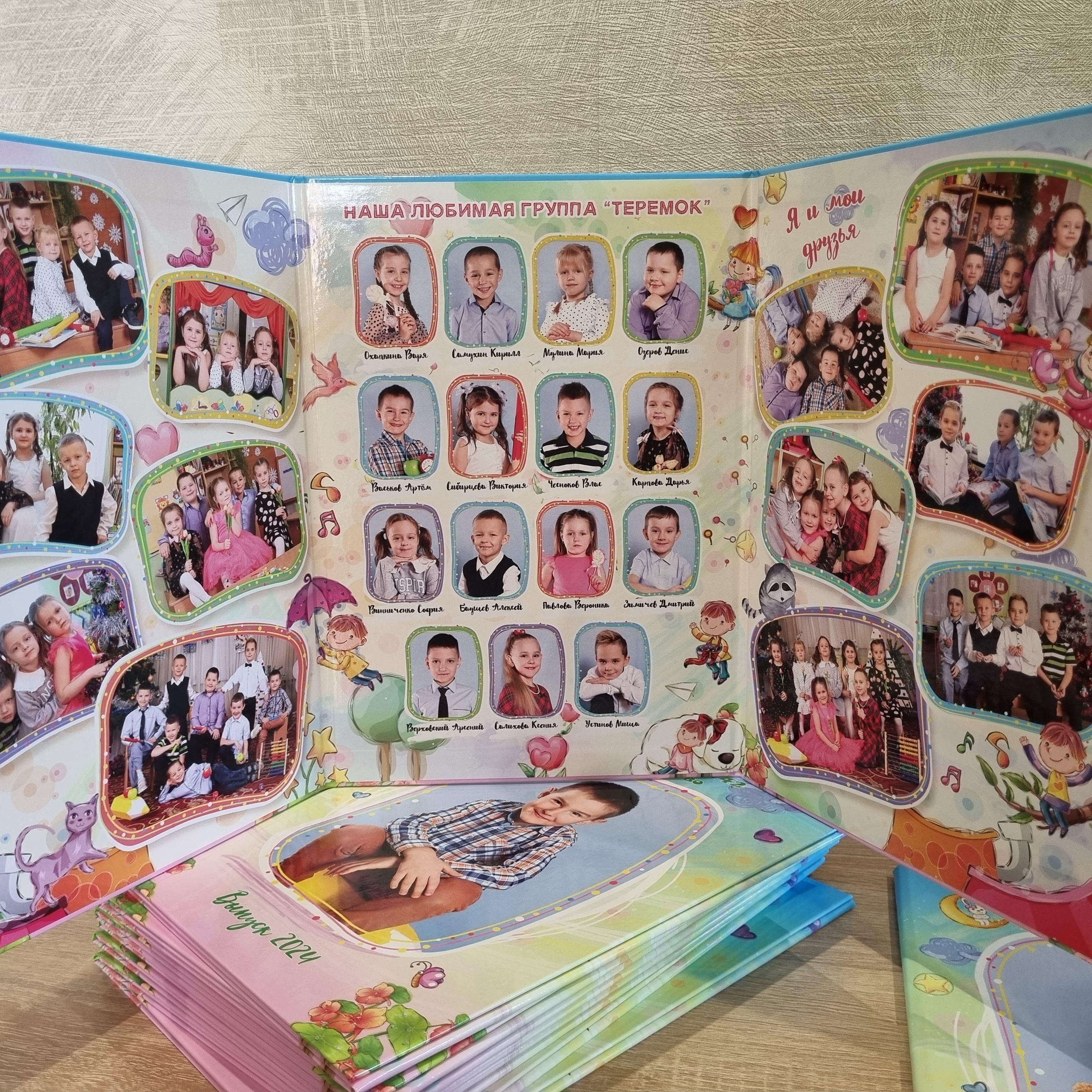 Фото готовых выпускных альбомов для детского сада и школы в Иваново Ярославле Костроме Владимире. Выпускные альбомы в Иваново в детский сад и школу. Александр и Светлана Янкины
