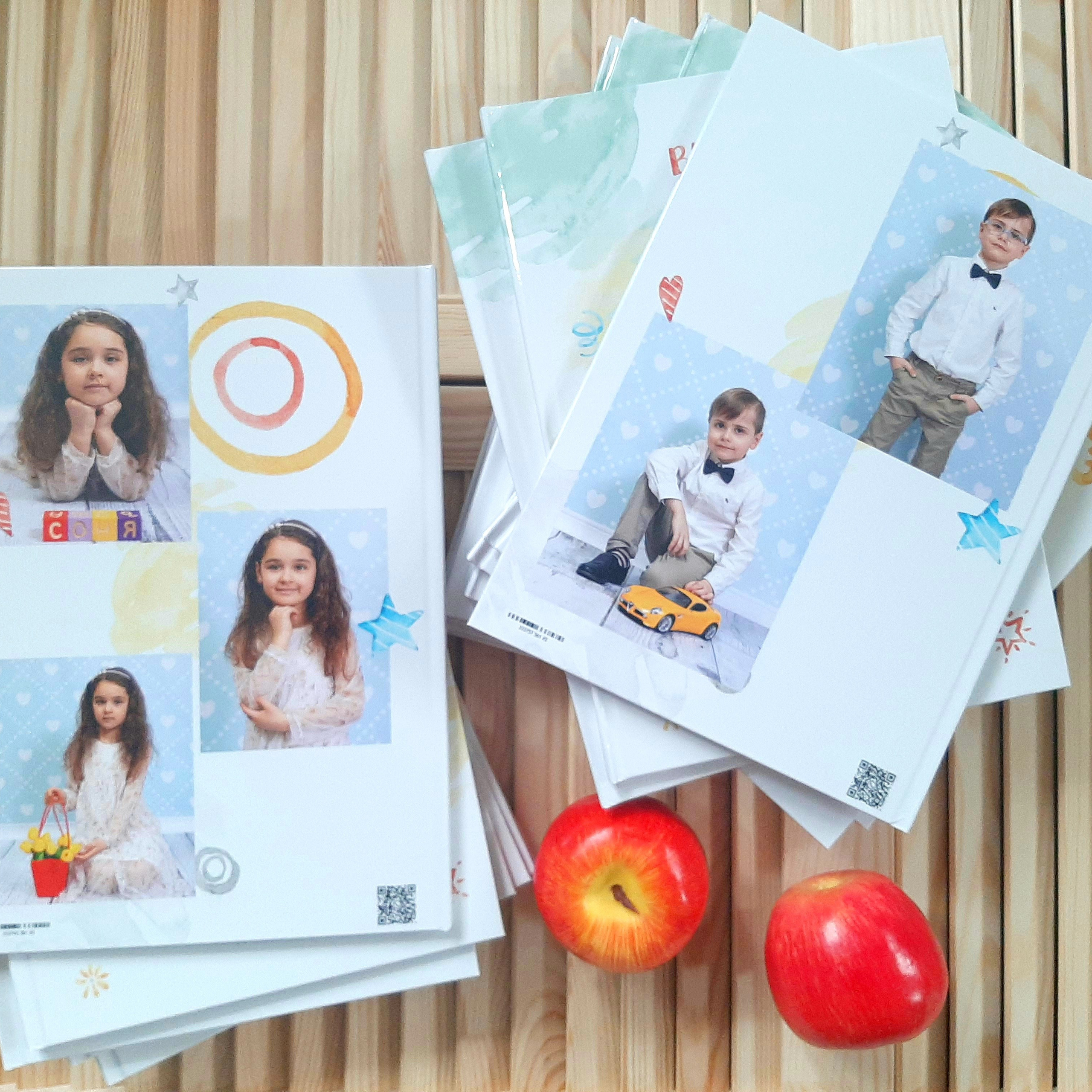 Фото готовых выпускных альбомов для детского сада и школы в Иваново Ярославле Костроме Владимире. Выпускные альбомы в Иваново в детский сад и школу. Александр и Светлана Янкины