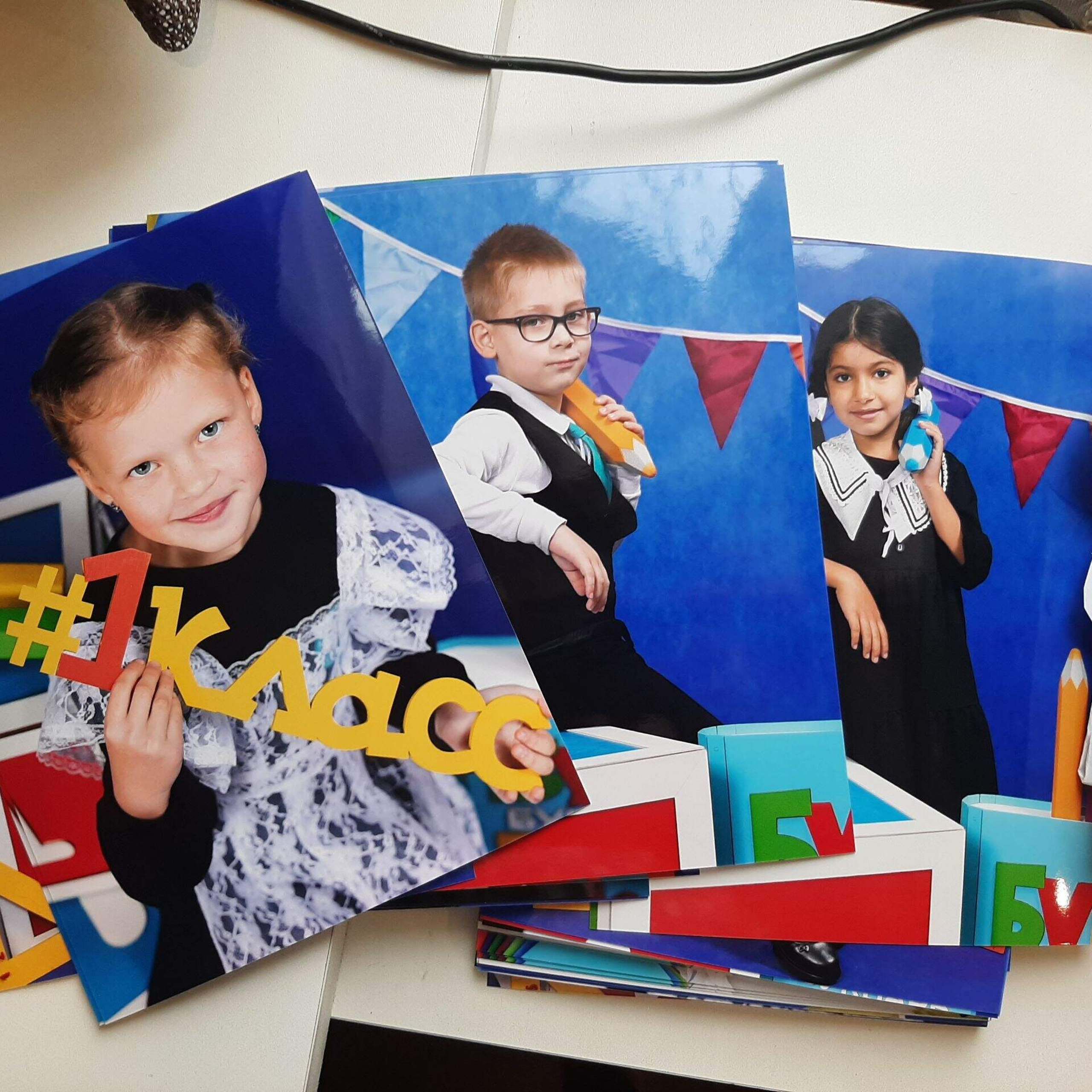 Фото готовых выпускных альбомов для детского сада и школы в Иваново Ярославле Костроме Владимире. Выпускные альбомы в Иваново в детский сад и школу. Александр и Светлана Янкины