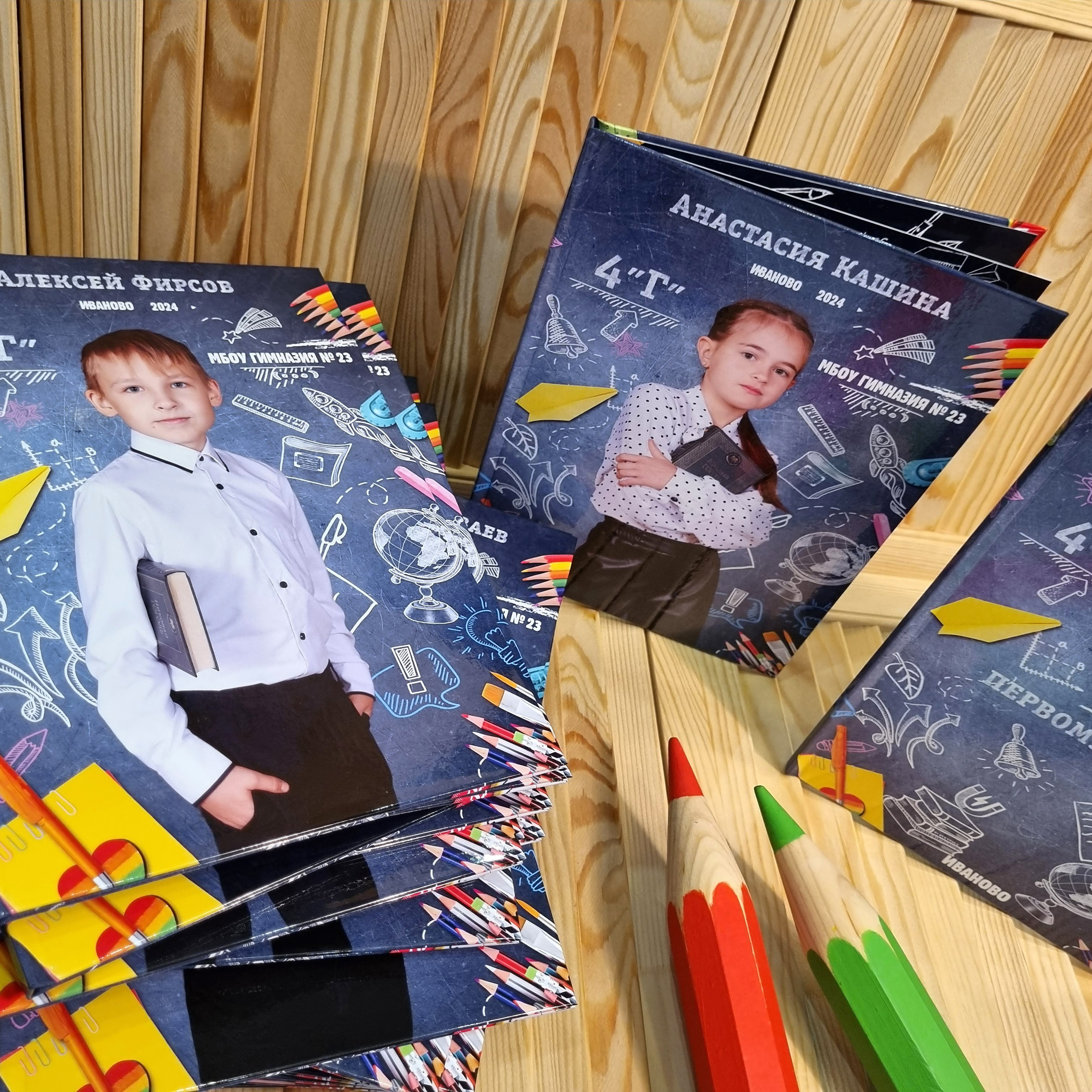 Фото готовых выпускных альбомов для детского сада и школы в Иваново Ярославле Костроме Владимире. Выпускные альбомы в Иваново в детский сад и школу. Александр и Светлана Янкины