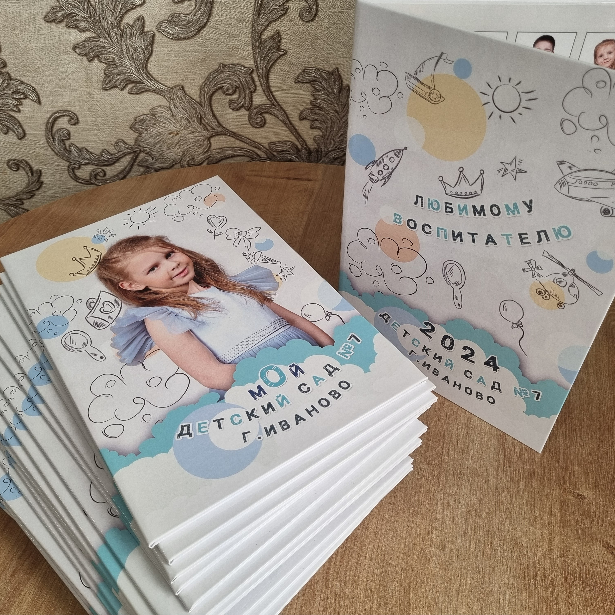 Фото готовых выпускных альбомов для детского сада и школы в Иваново Ярославле Костроме Владимире. Выпускные альбомы в Иваново в детский сад и школу. Александр и Светлана Янкины