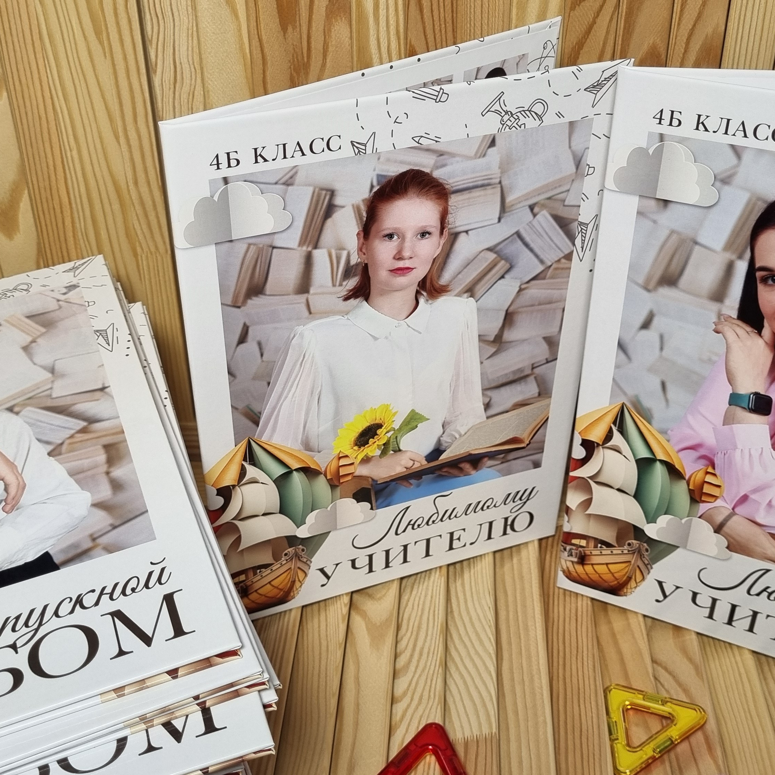 Фото готовых выпускных альбомов для детского сада и школы в Иваново Ярославле Костроме Владимире. Выпускные альбомы в Иваново в детский сад и школу. Александр и Светлана Янкины