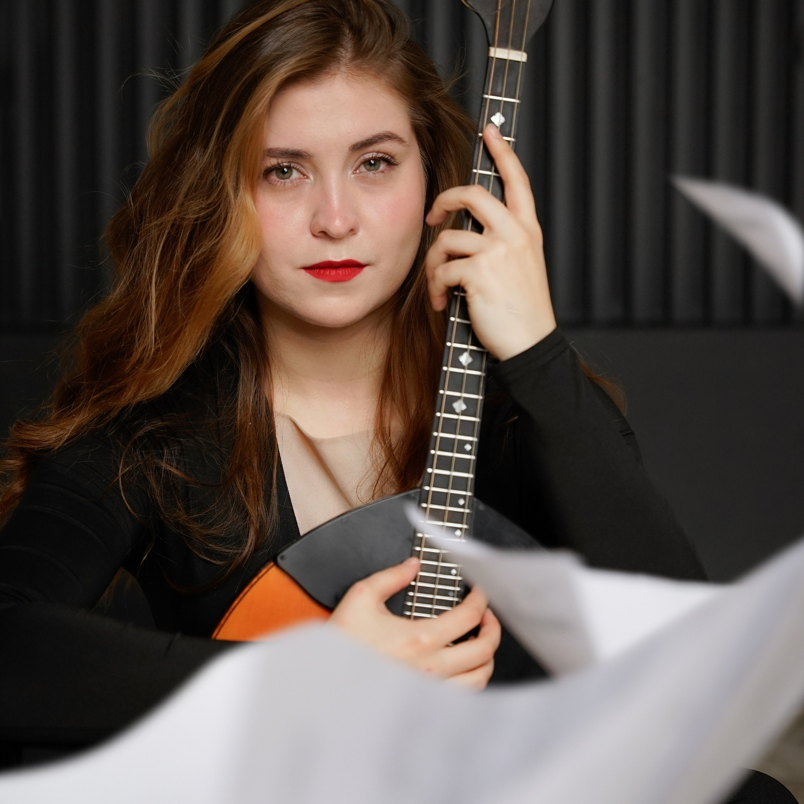 Фотосессия музыканта с домрой