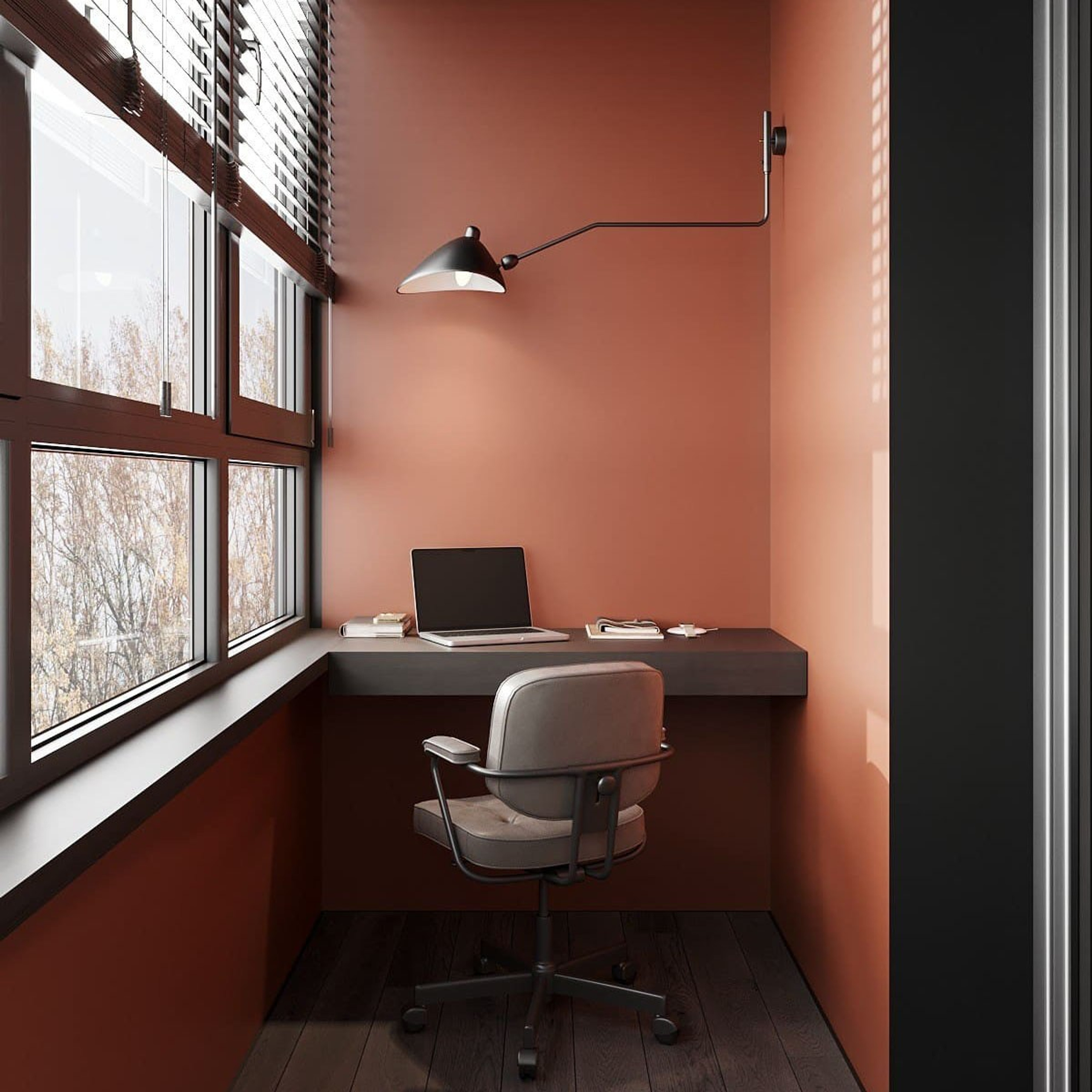 Рабочее место на балконе, отделанное в терракотовом цвете.