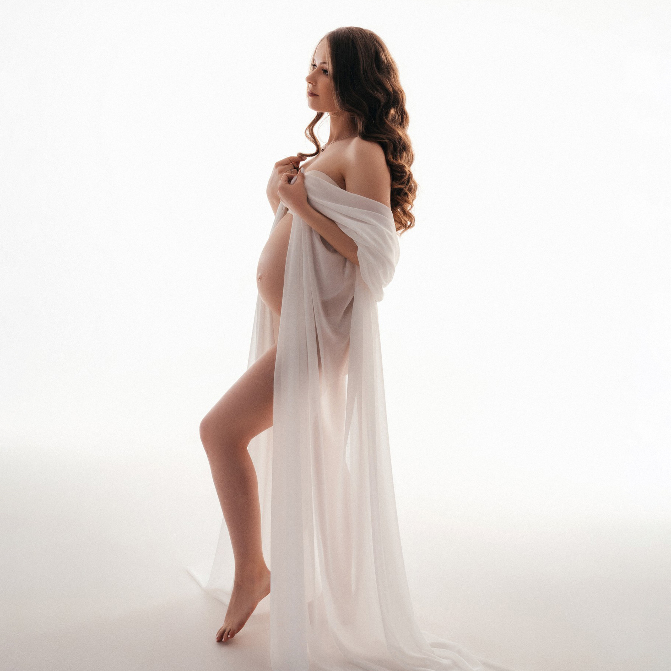 фотосессия для беременных в тканях