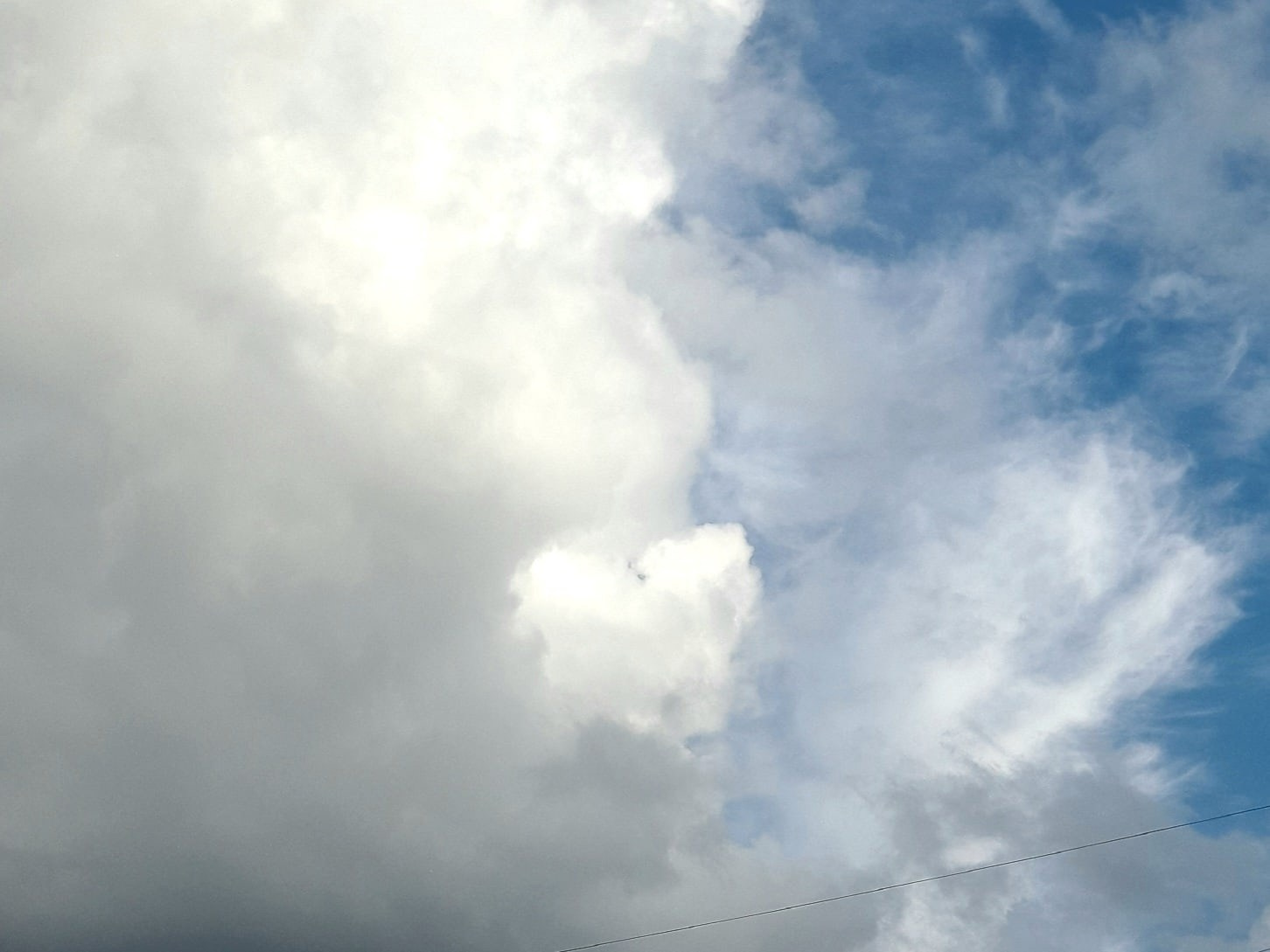 a cloud in a shape of a heart, love