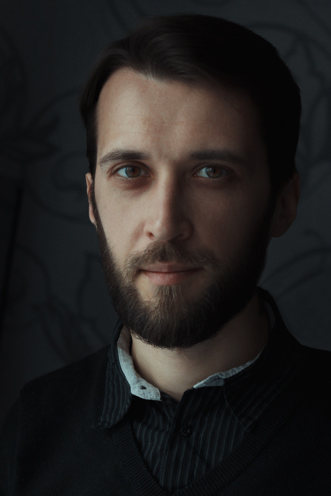 Портрет интерьерного фотографа Алексея Слюсаренко