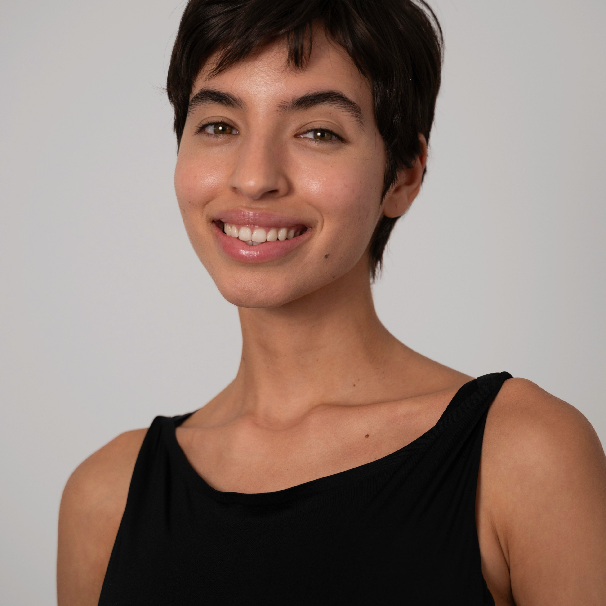Smiling model portrait in a black top