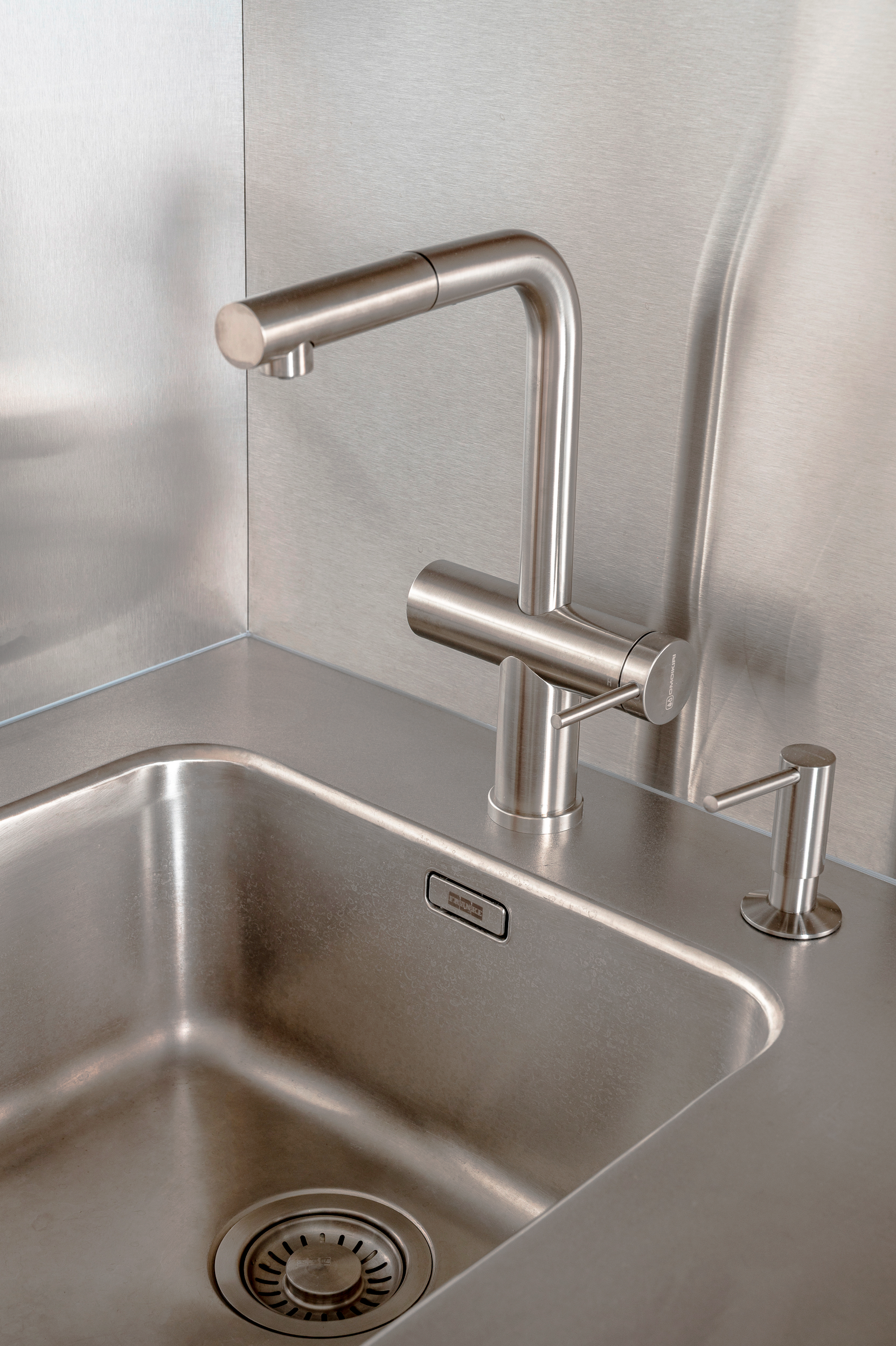 Stainless-steel kitchen sink and tap