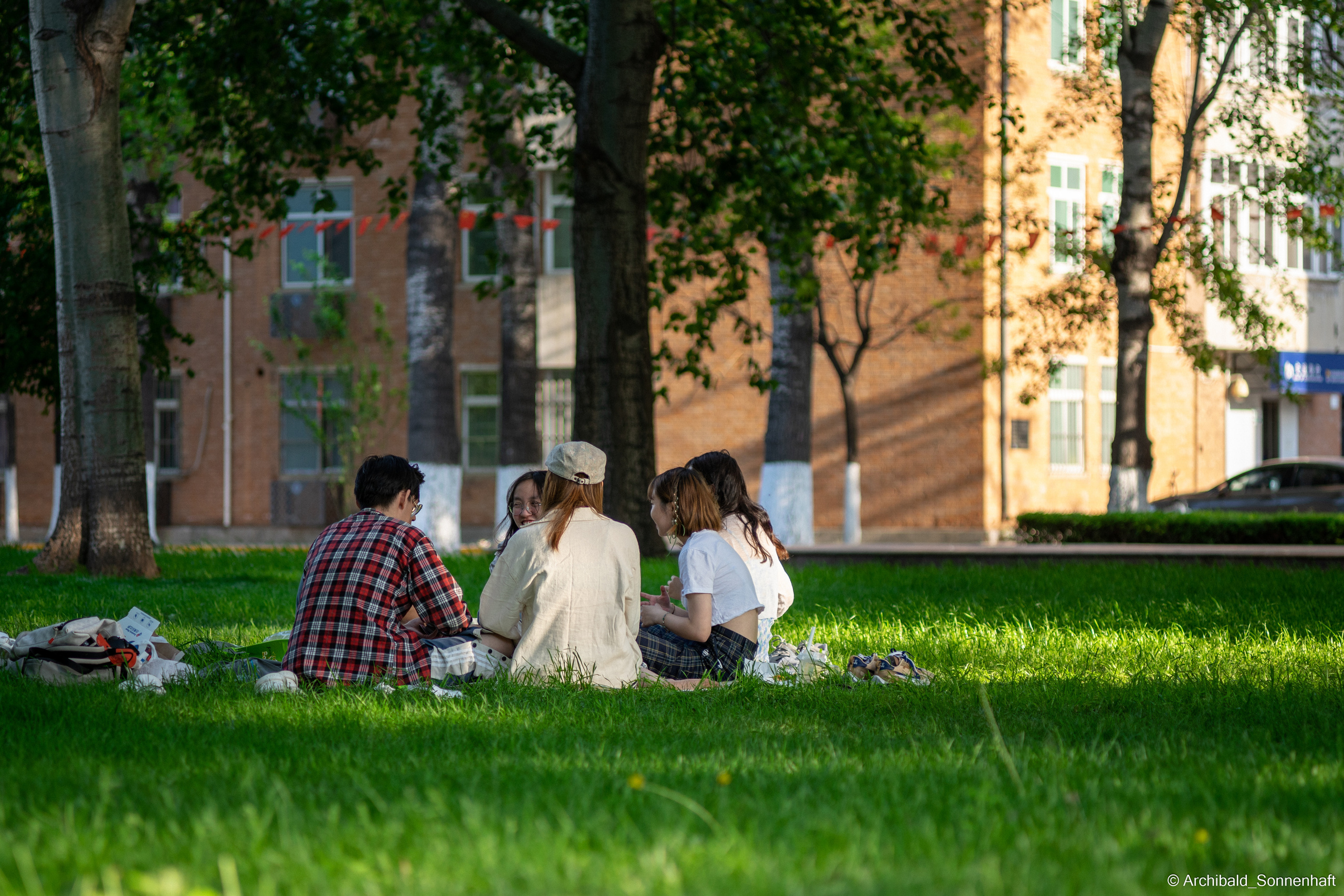 Walking in TJU on the first of May. Photographer in Guangzhou, China. Archibald Sonnenhaft