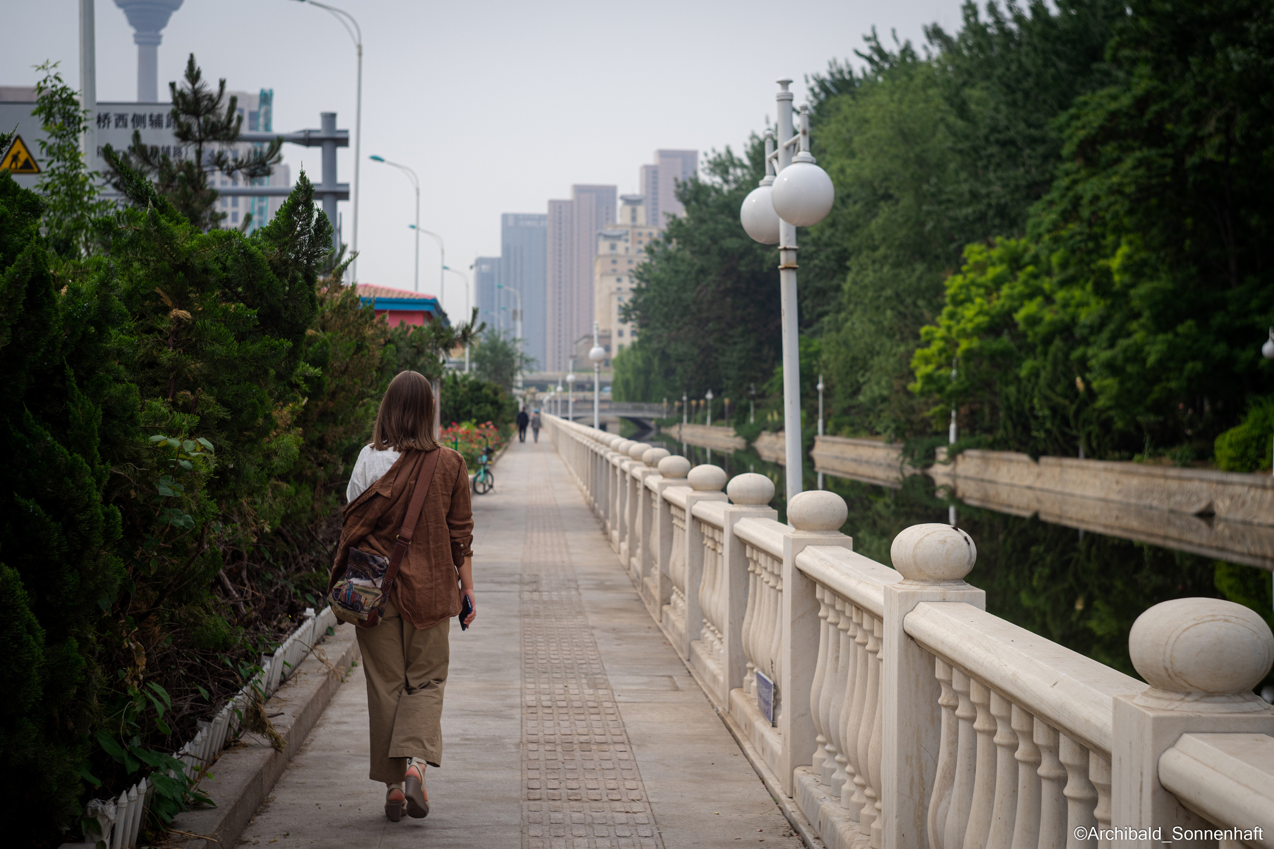 Campaign to the radio station. Photographer in Guangzhou, China. Archibald Sonnenhaft