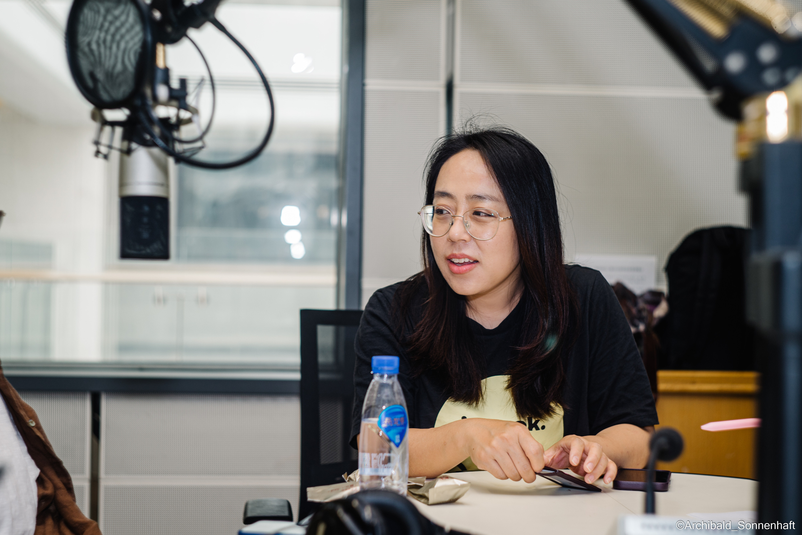 Campaign to the radio station. Photographer in Guangzhou, China. Archibald Sonnenhaft