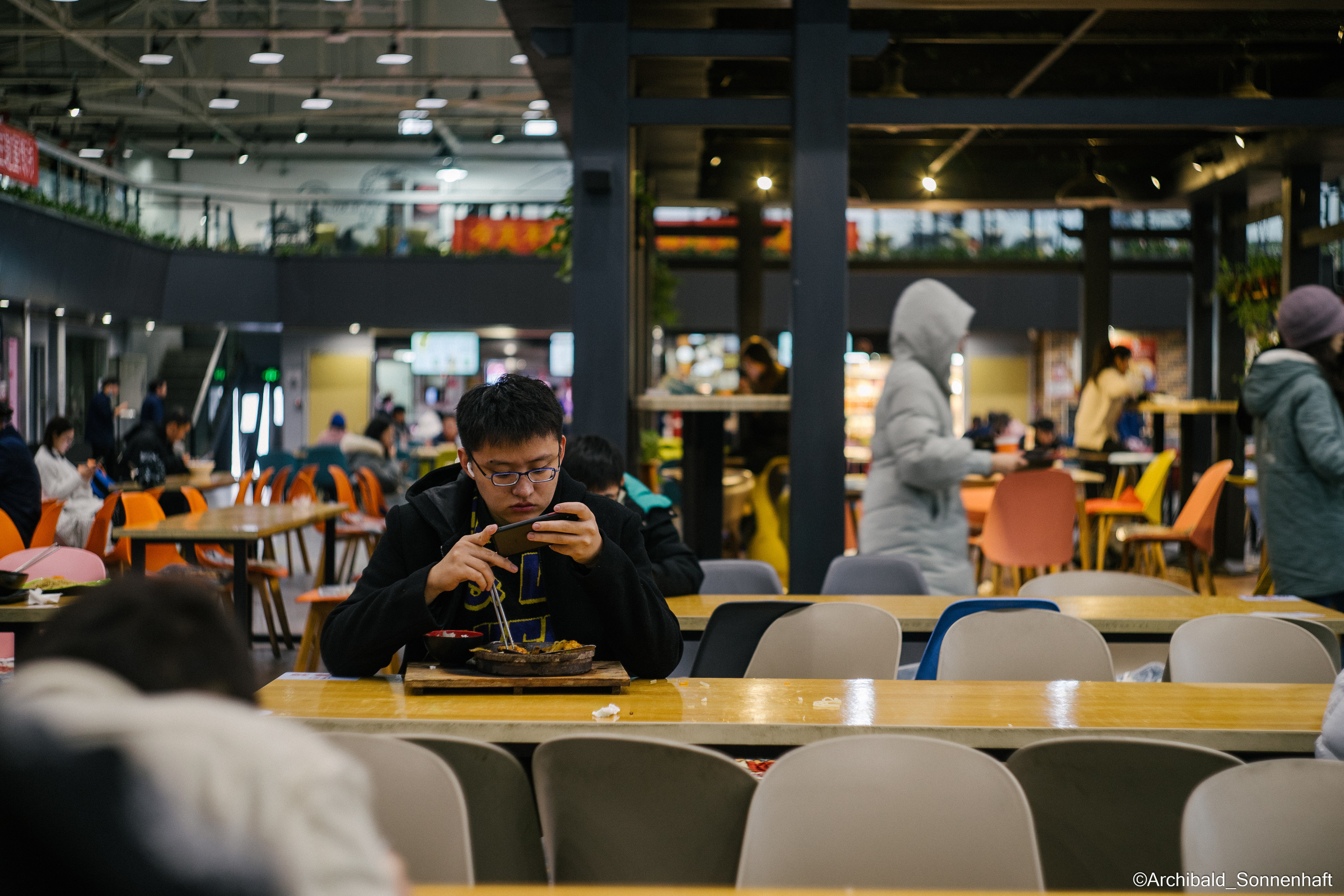 Campaign to the radio station. Photographer in Guangzhou, China. Archibald Sonnenhaft