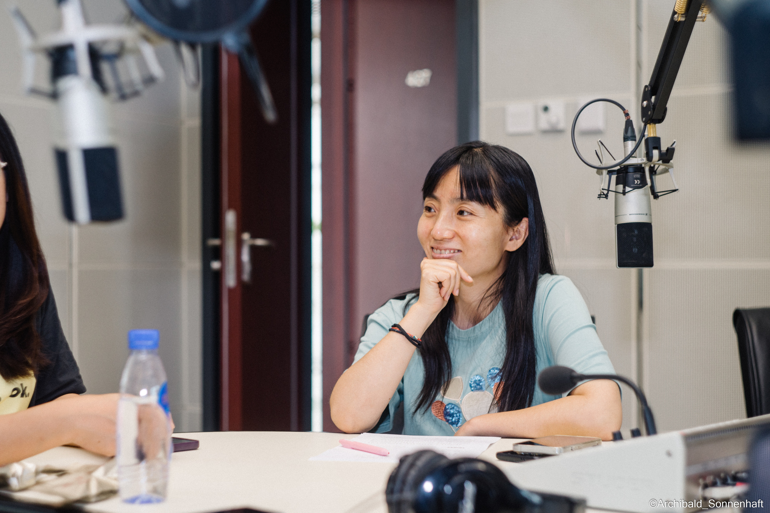 Campaign to the radio station. Photographer in Guangzhou, China. Archibald Sonnenhaft