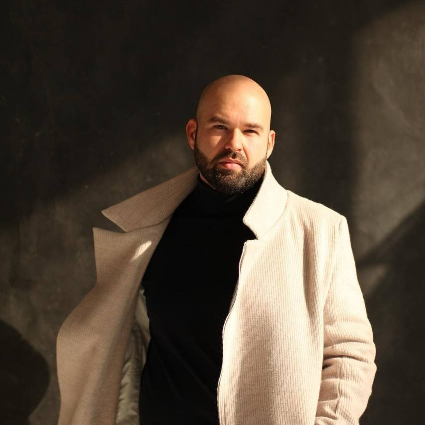 Модельер Евгений Бременев