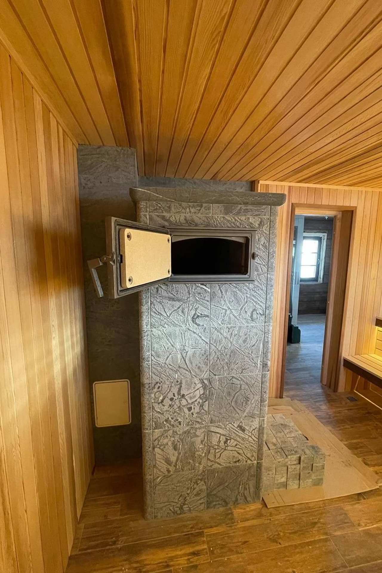Баня «по-серому» с&nbsp;печью Tulikivi Grinion