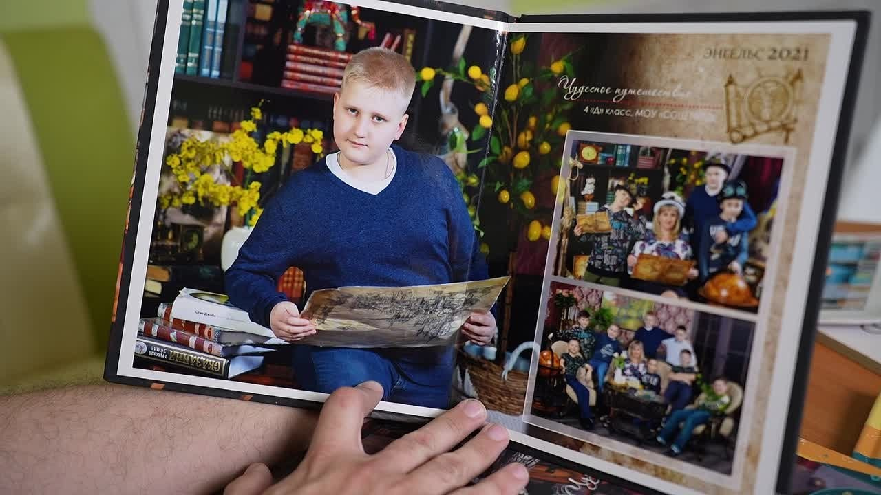 5. Фотокнига премиум «Путешествие»: 22×30, виньетка своими руками, телескоп и штурвал в кадре