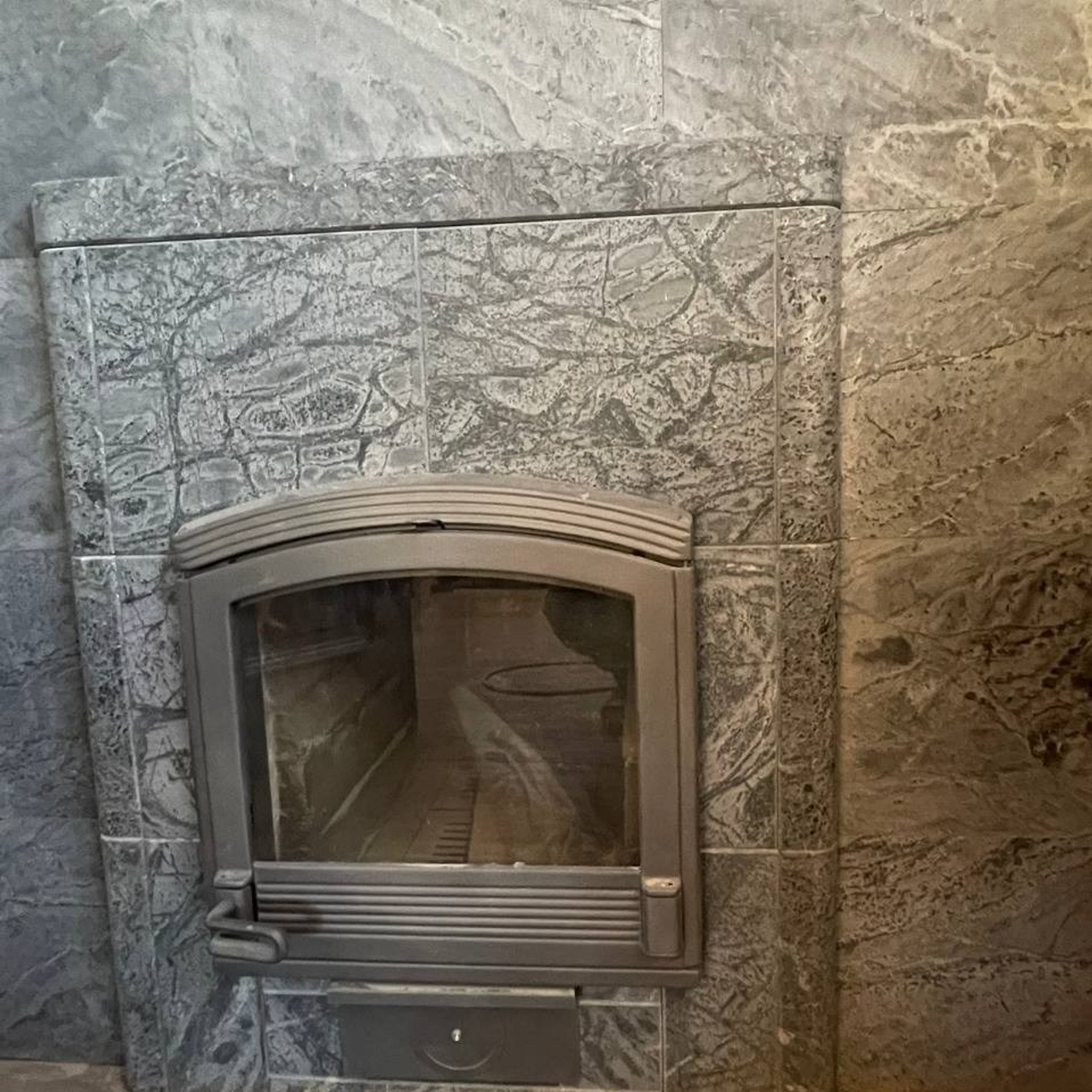 печь Tulikivi с каменной закладкой