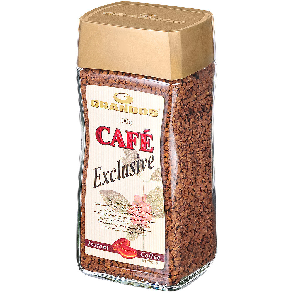 Кофе растворимый в стеклянной банке с желтой этикеткой и жёлтой крышкой.