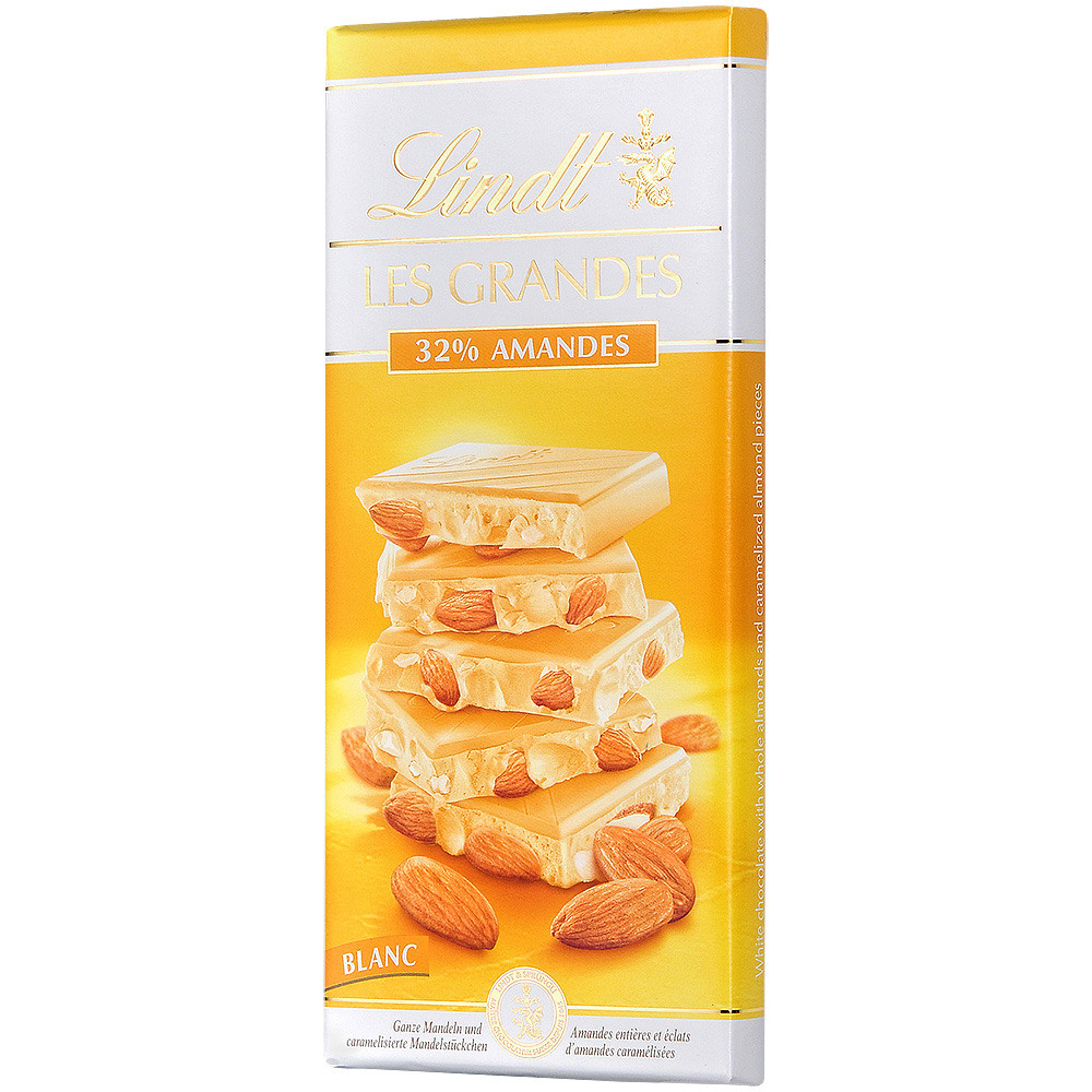 Шоколад в белой упаковке на белом фоне.