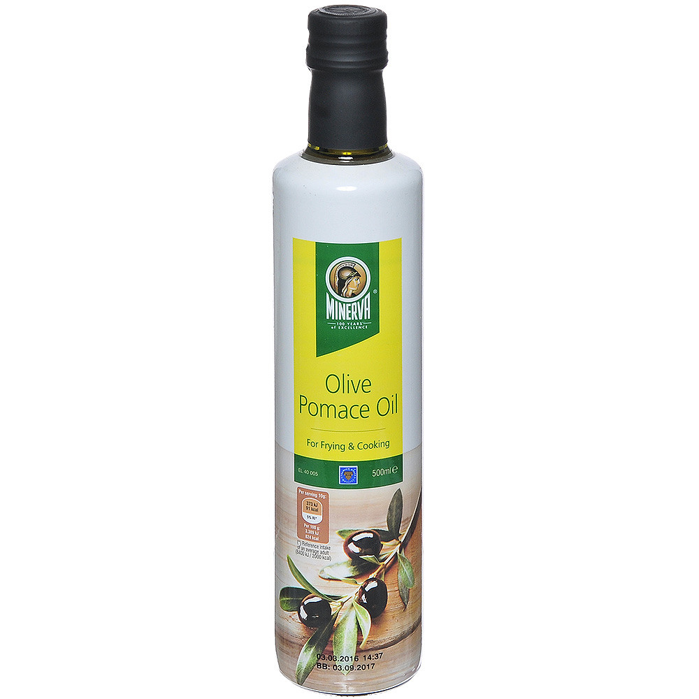 масло в белой бутылке на белом фоне