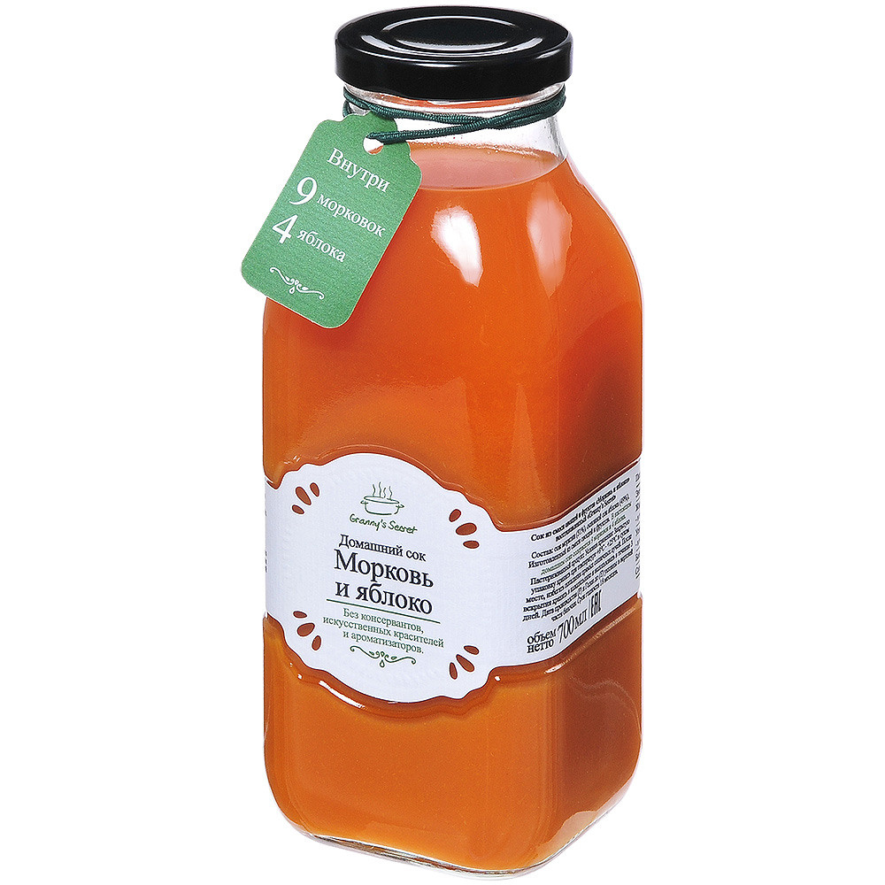 бутылка с соком из моркови и яблок на белом фоне