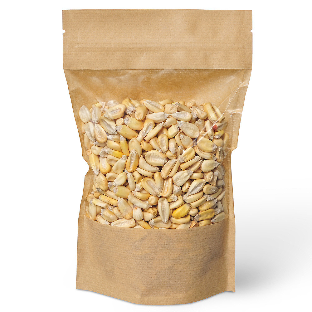 прозрачная упаковка орехов на белом фоне