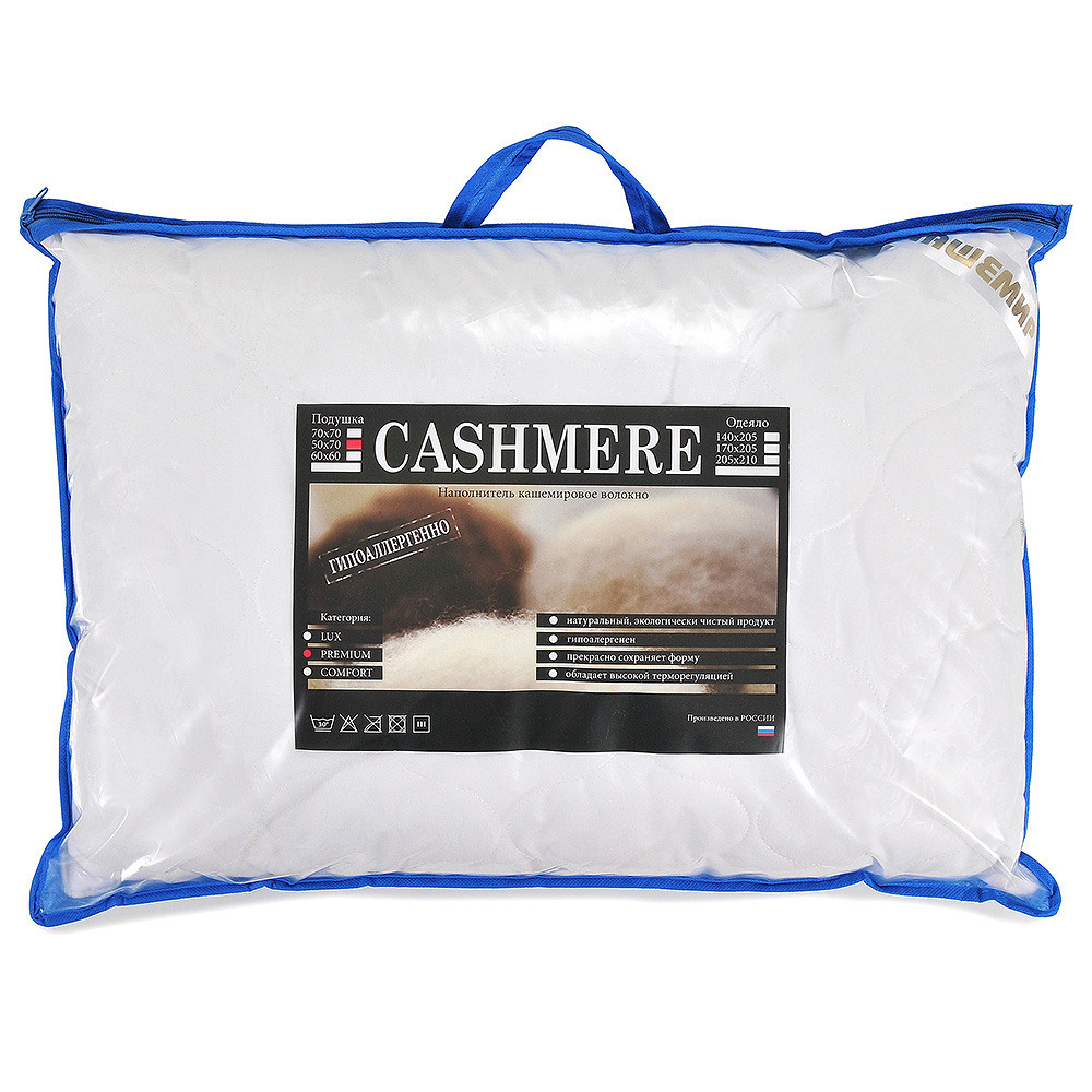 Белая подушка в упаковке