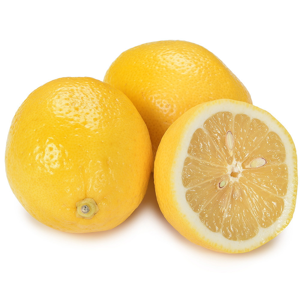 Лимон на белом фоне с тенью.