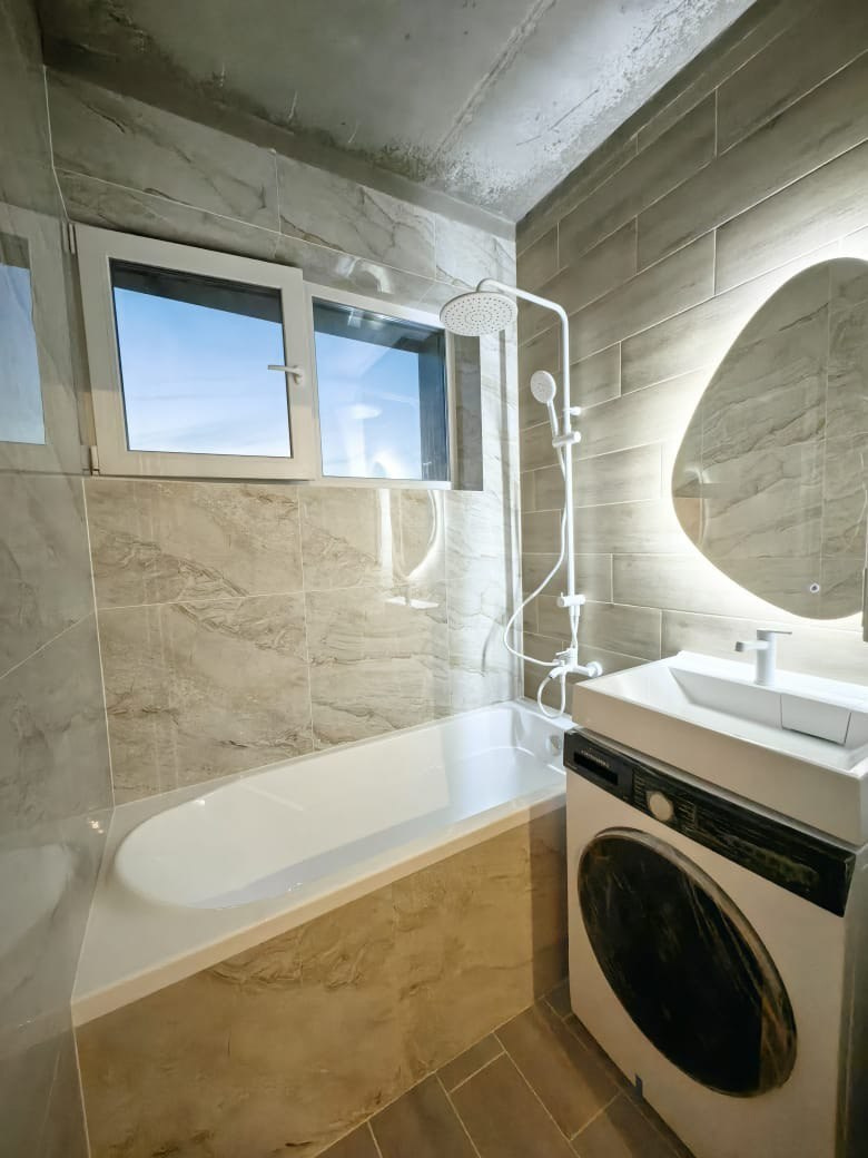 Ванная комната (с. Осиново ул. Спортивная д. 8). Ремонт санузла, туалета, ванной под ключ в Казани. Укладка плитки