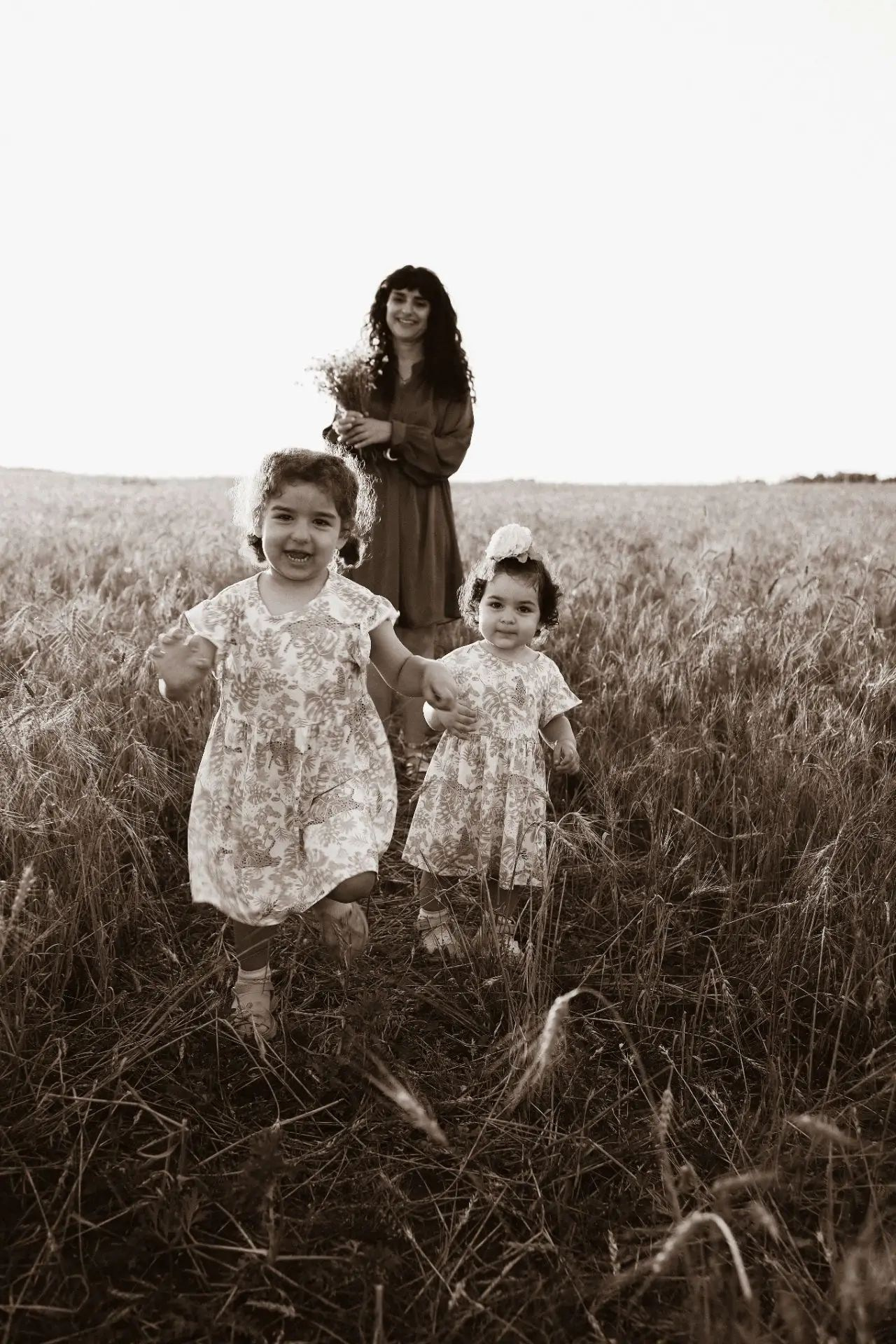 Мама с доченьками. Фотограф Анастасия Фальковская