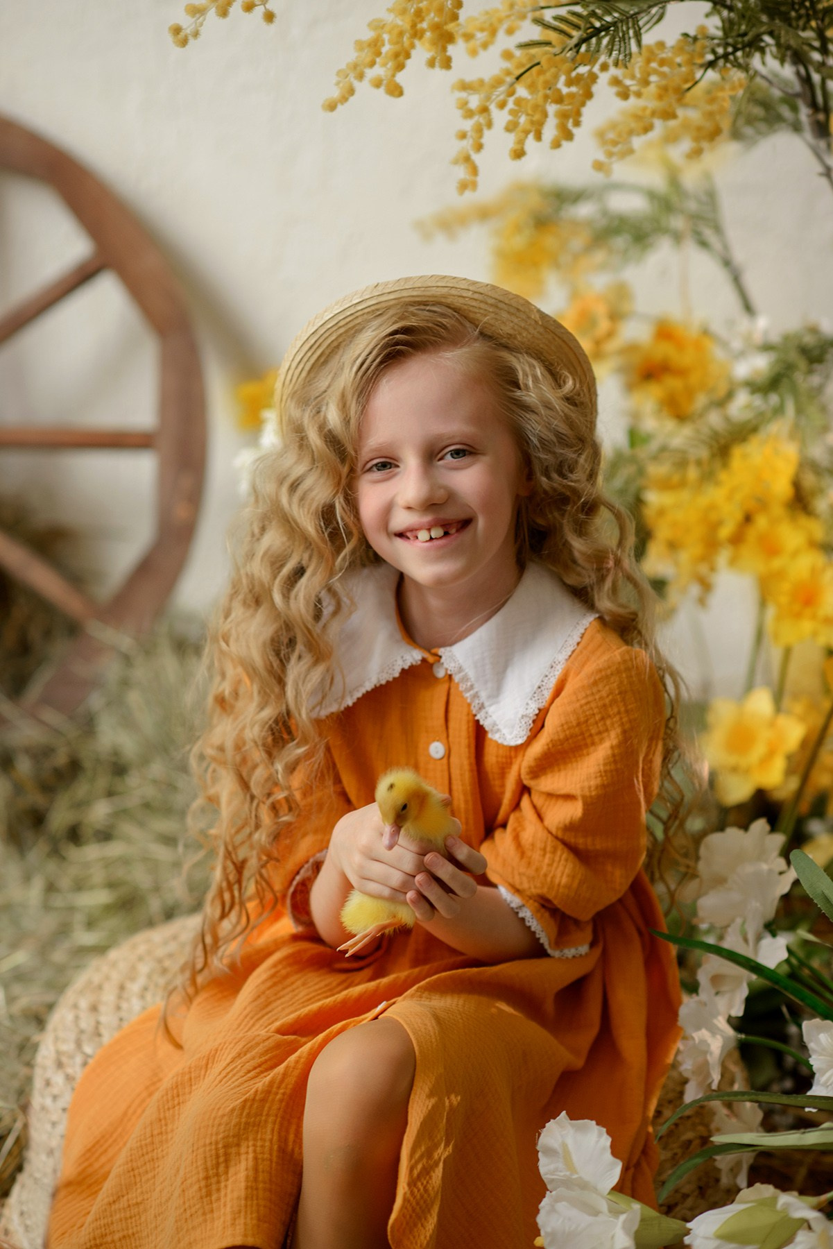 Photo shoot of a girl with goslings and a hat. Photographer Elena Carruthers, Scotland