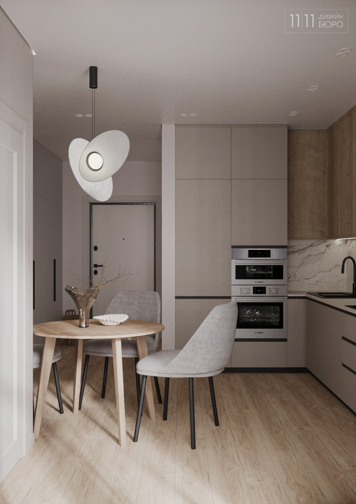 Интерьер небольшой кухни в бежевых тонах и круглым обеденным столом