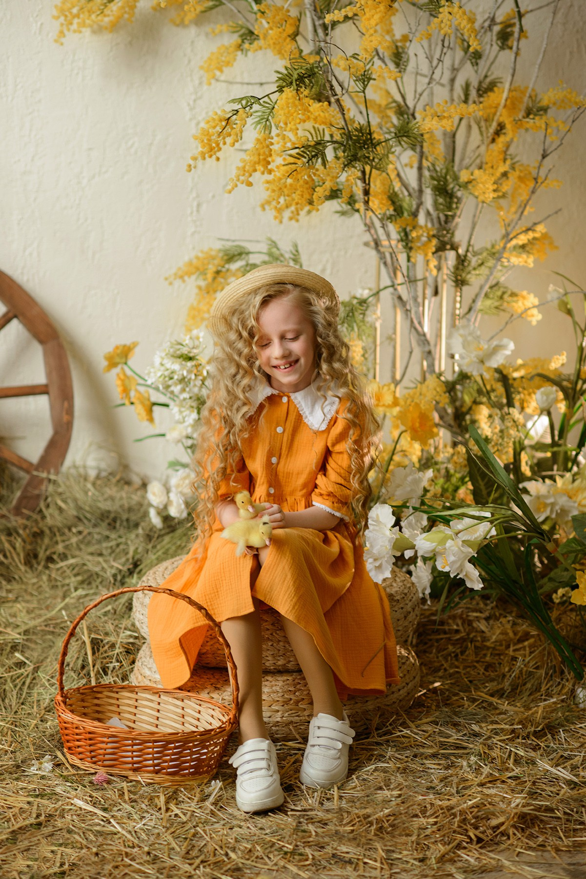 Photo shoot of a girl with goslings and a hat. Photographer Elena Carruthers, Scotland