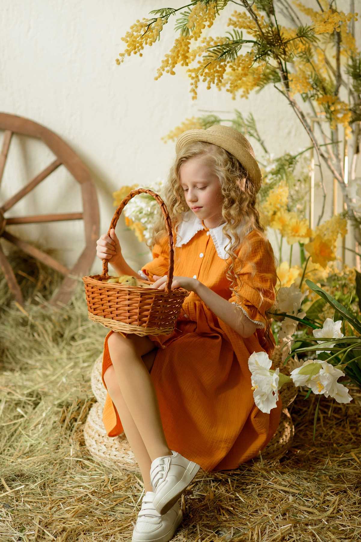 Photo shoot of a girl with goslings and a hat. Photographer Elena Carruthers, Scotland