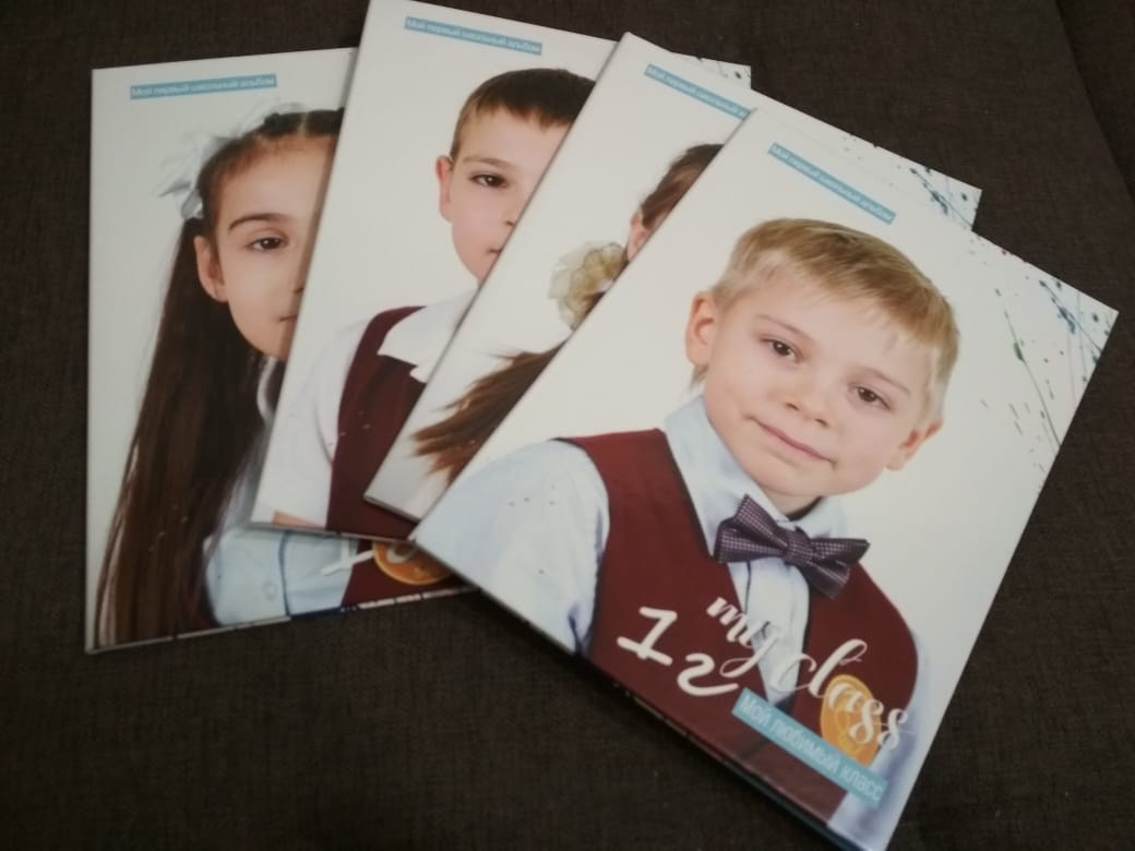 2500 р Книга на 2 разворота (4 страницы + обложка) формат 20×30. Фотограф Елена Лагода